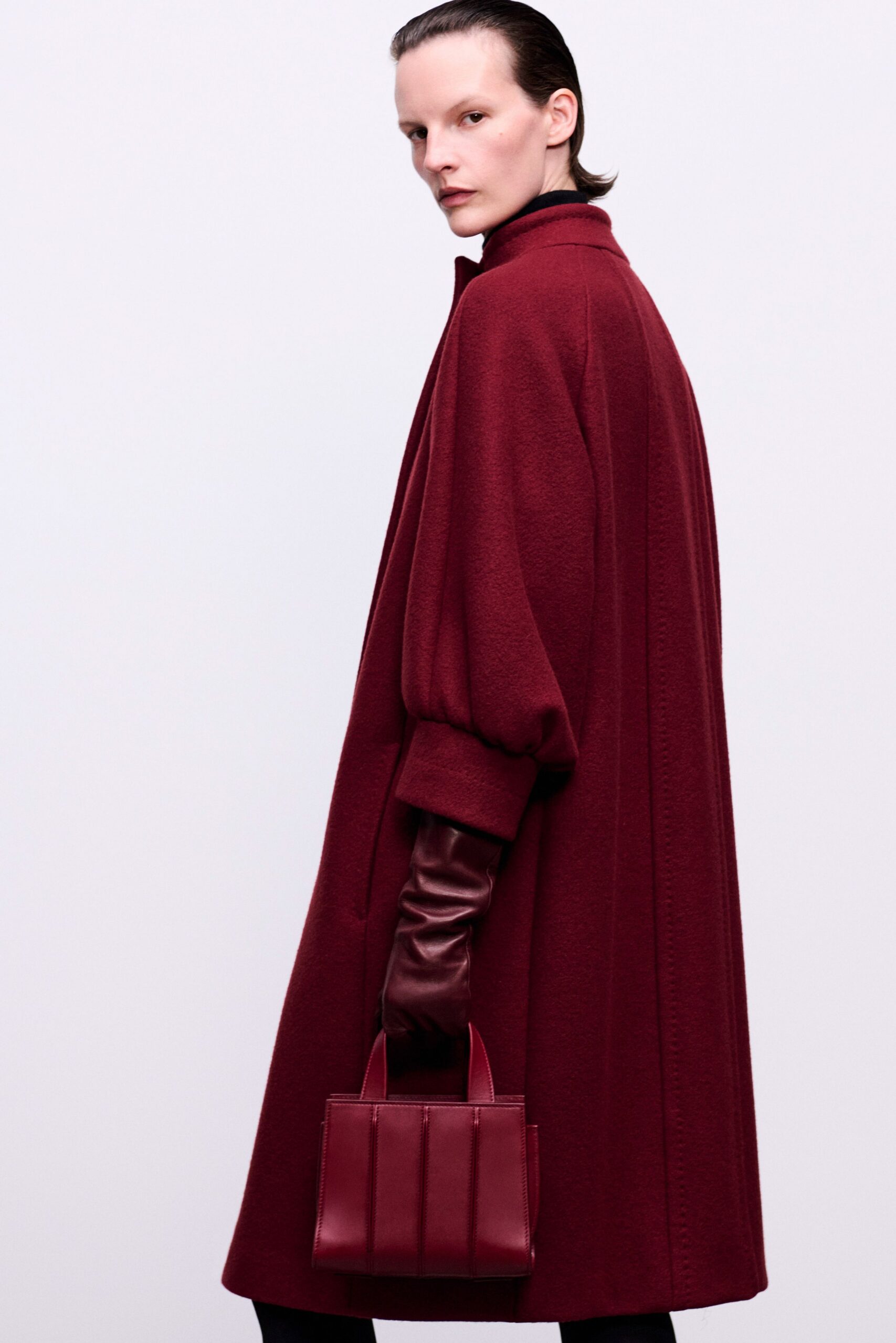 red wool long-sleeve collared relaxed buttoned coat