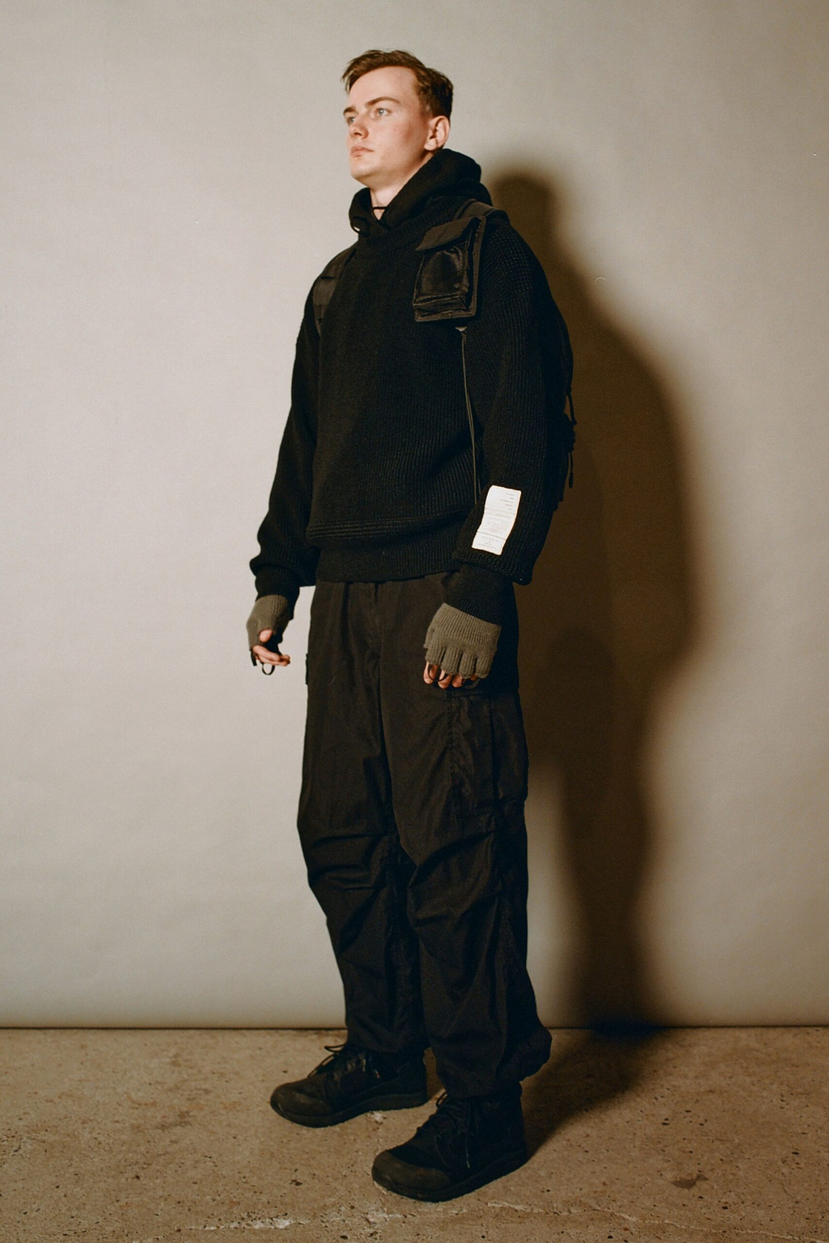 black hoodie and cargo pants