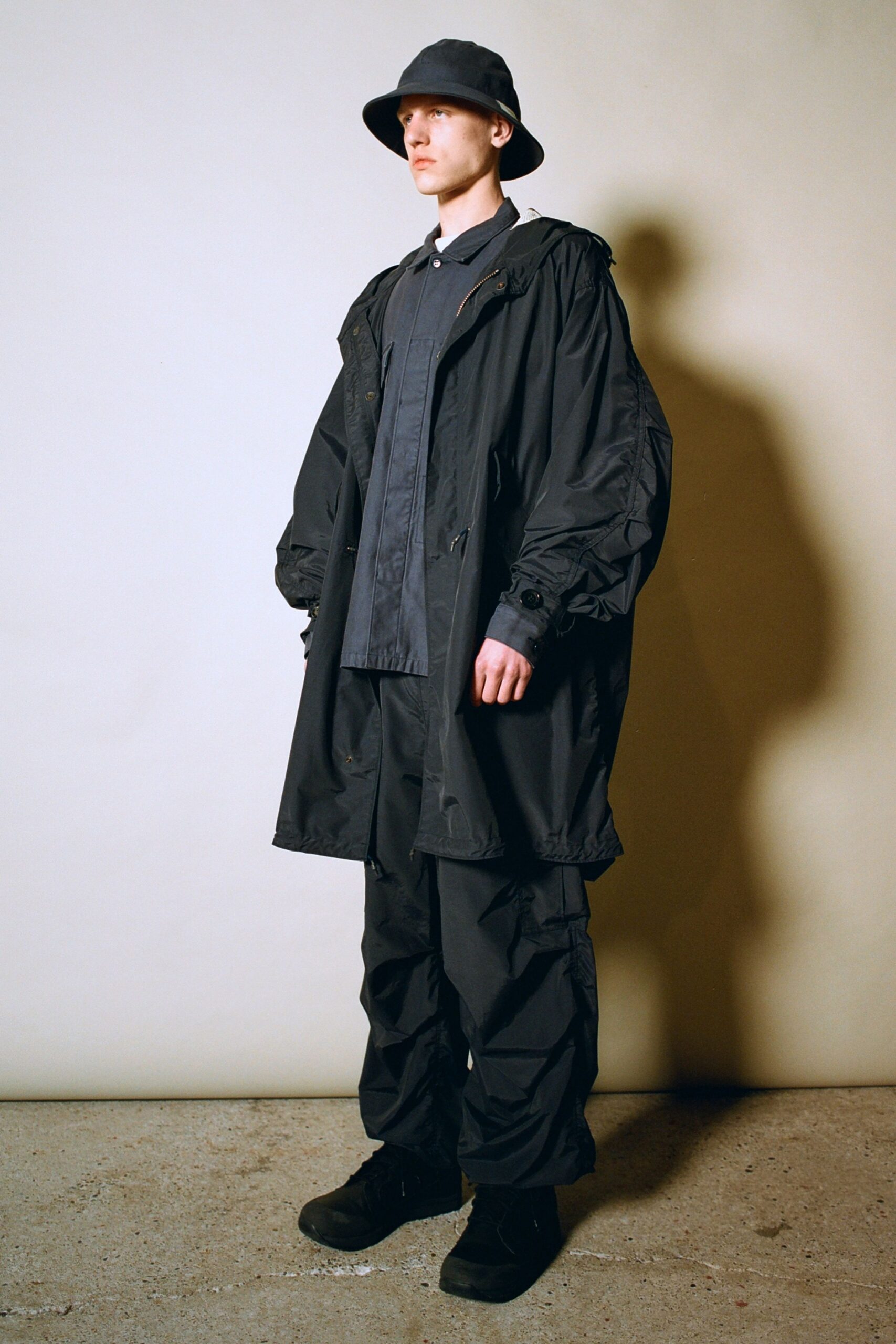 black jersey long-sleeve hooded relaxed zippered coat