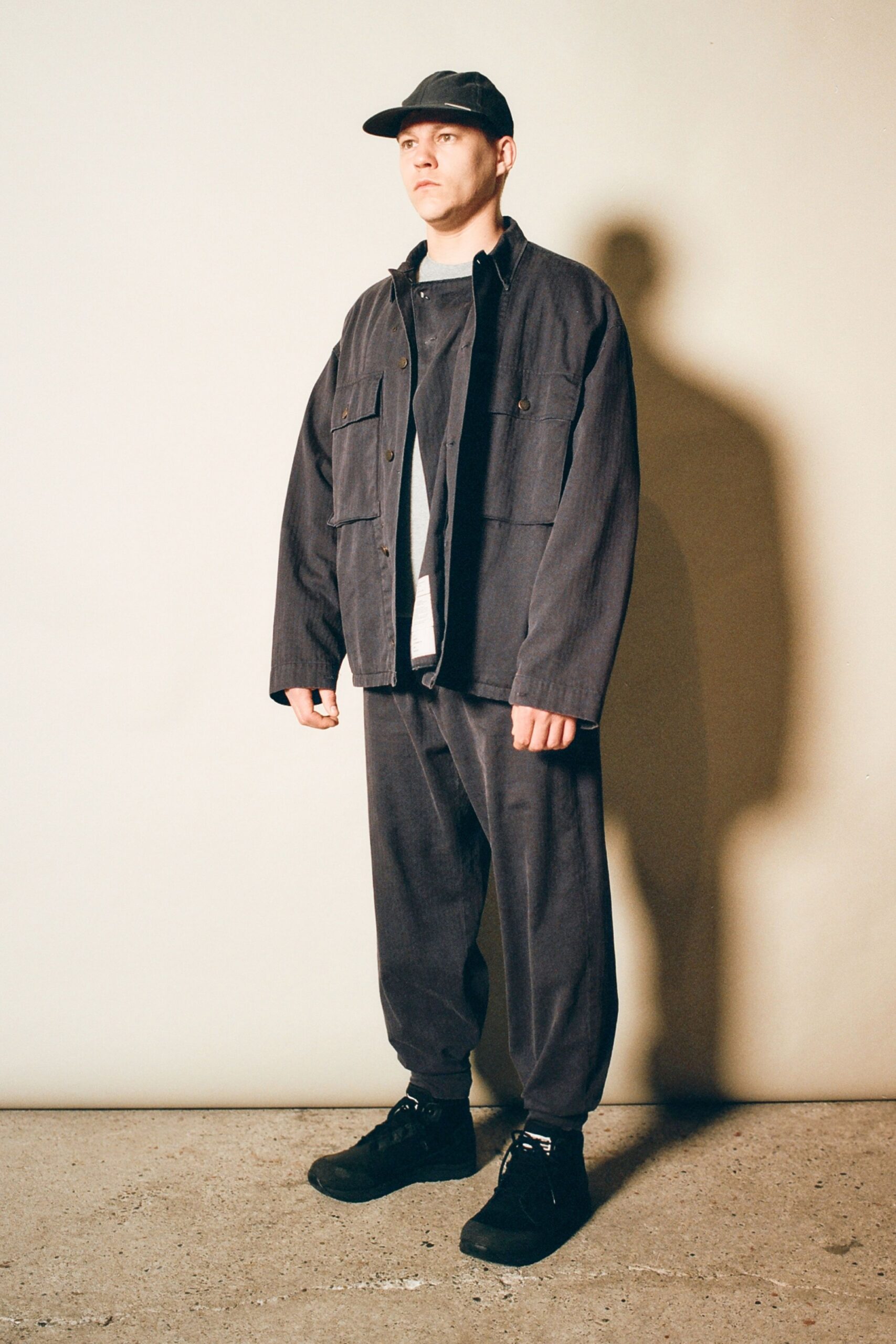 gray relaxed jacket with black shoes