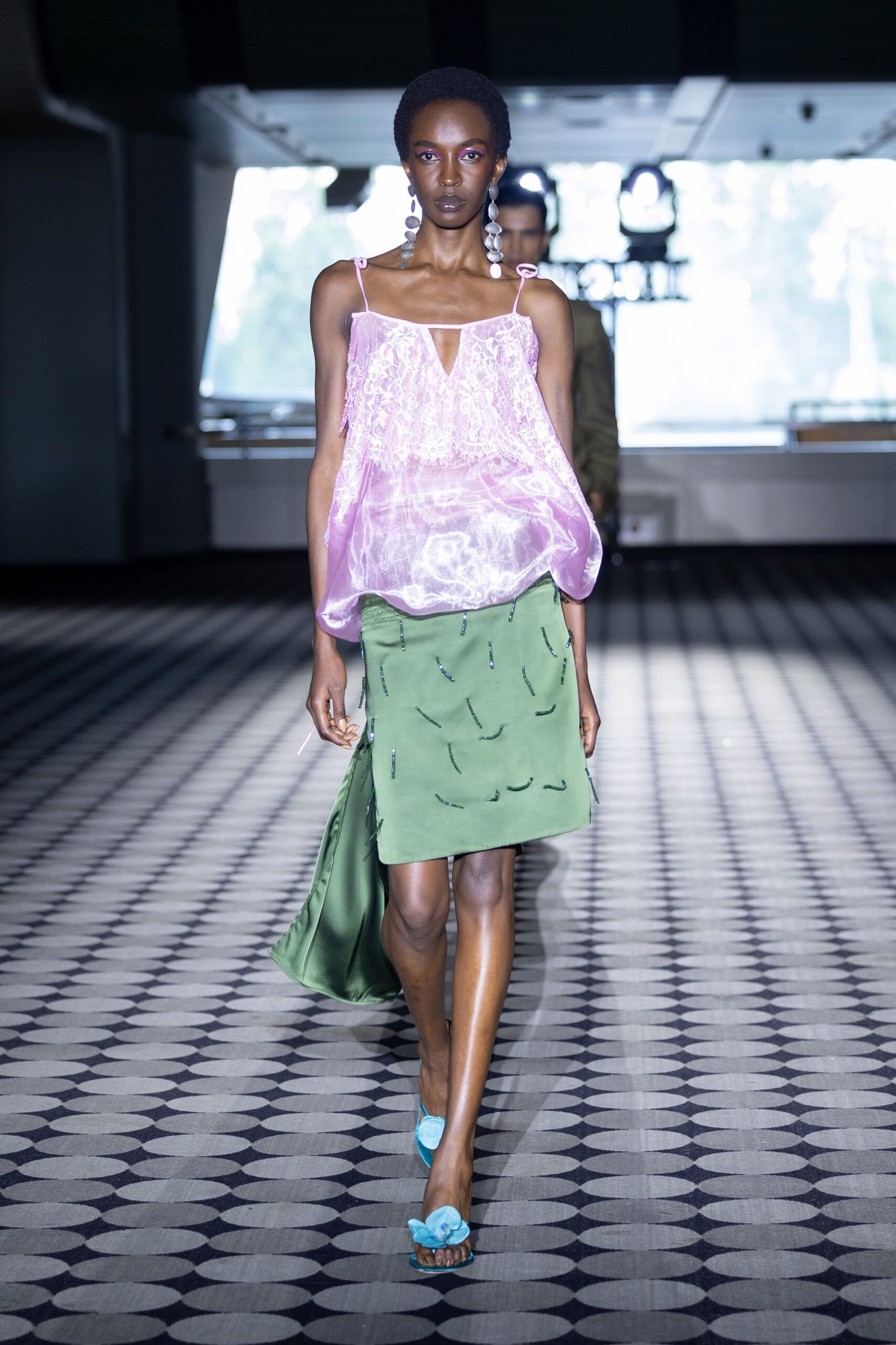 pink silk relaxed top with green skirt