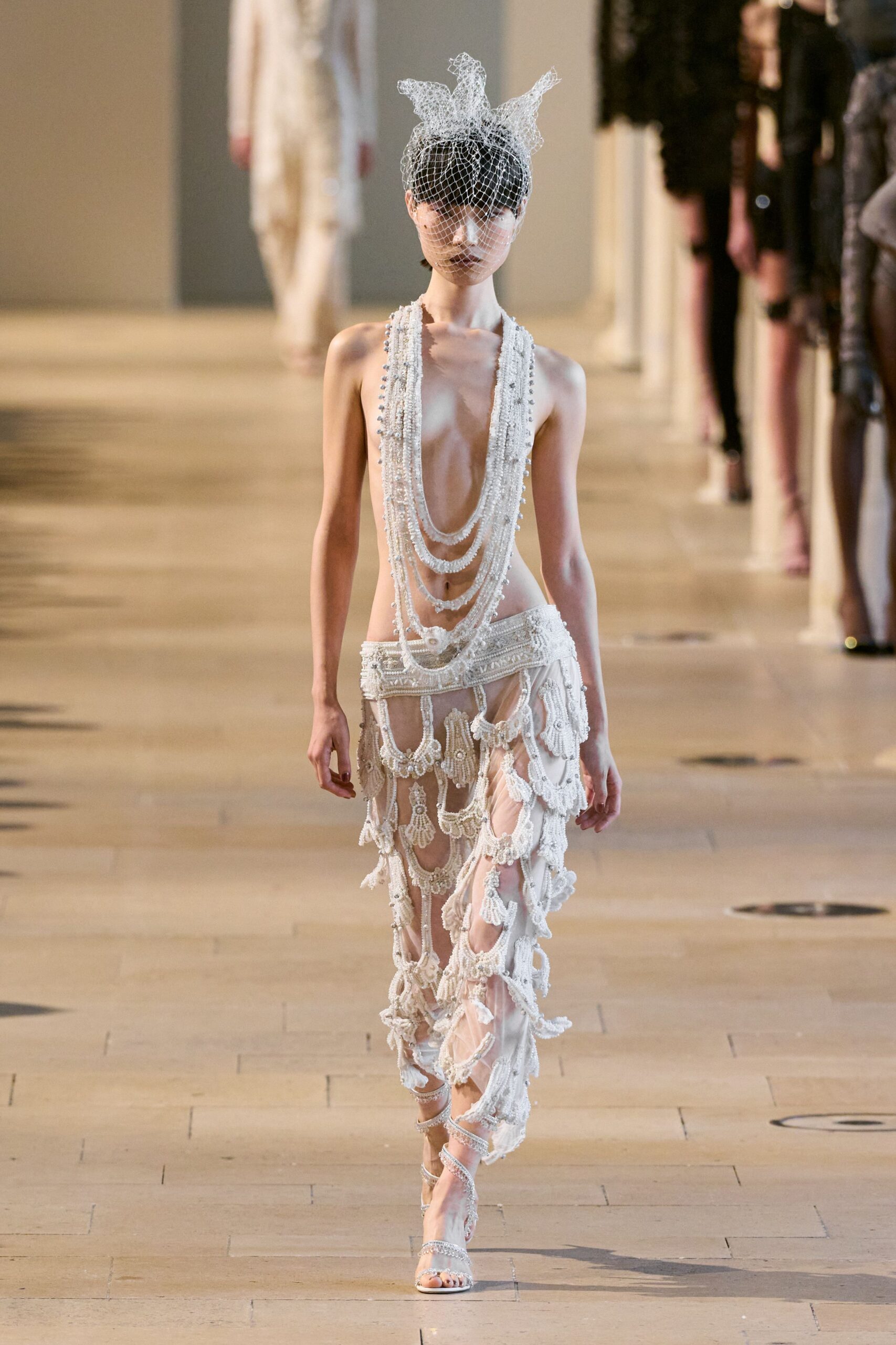 white silk sleeveless v-neck fitted fringed layered dress