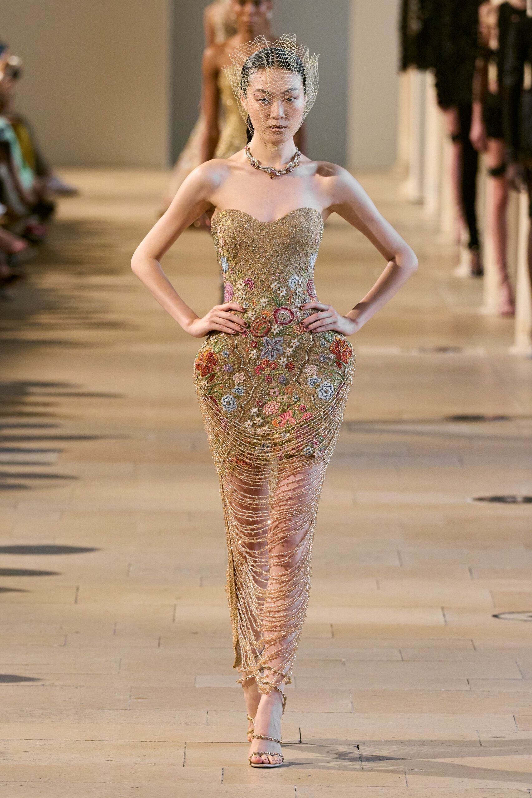 gold silk strapless fitted embroidered ruched shiny gown