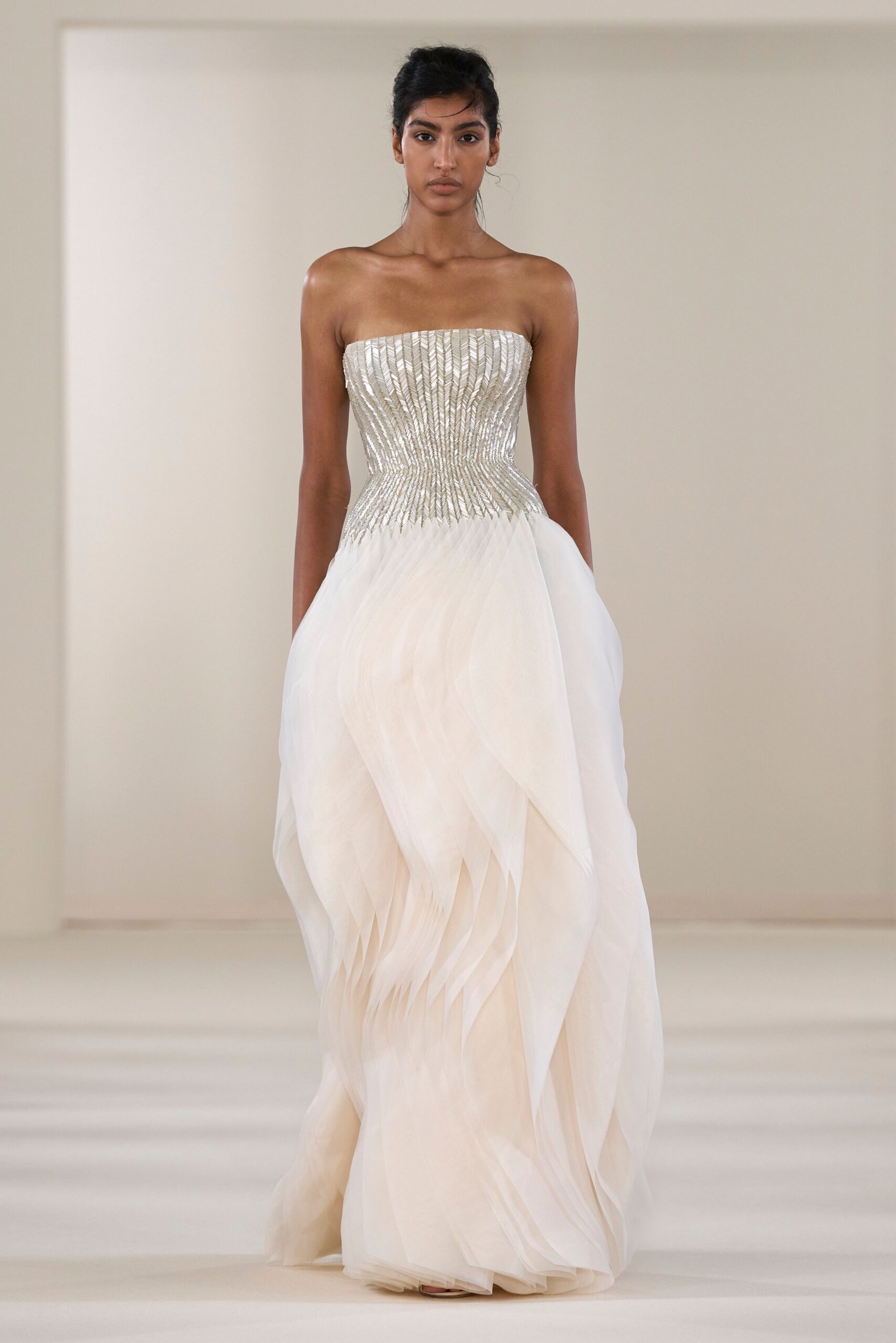 white strapless pleated gown