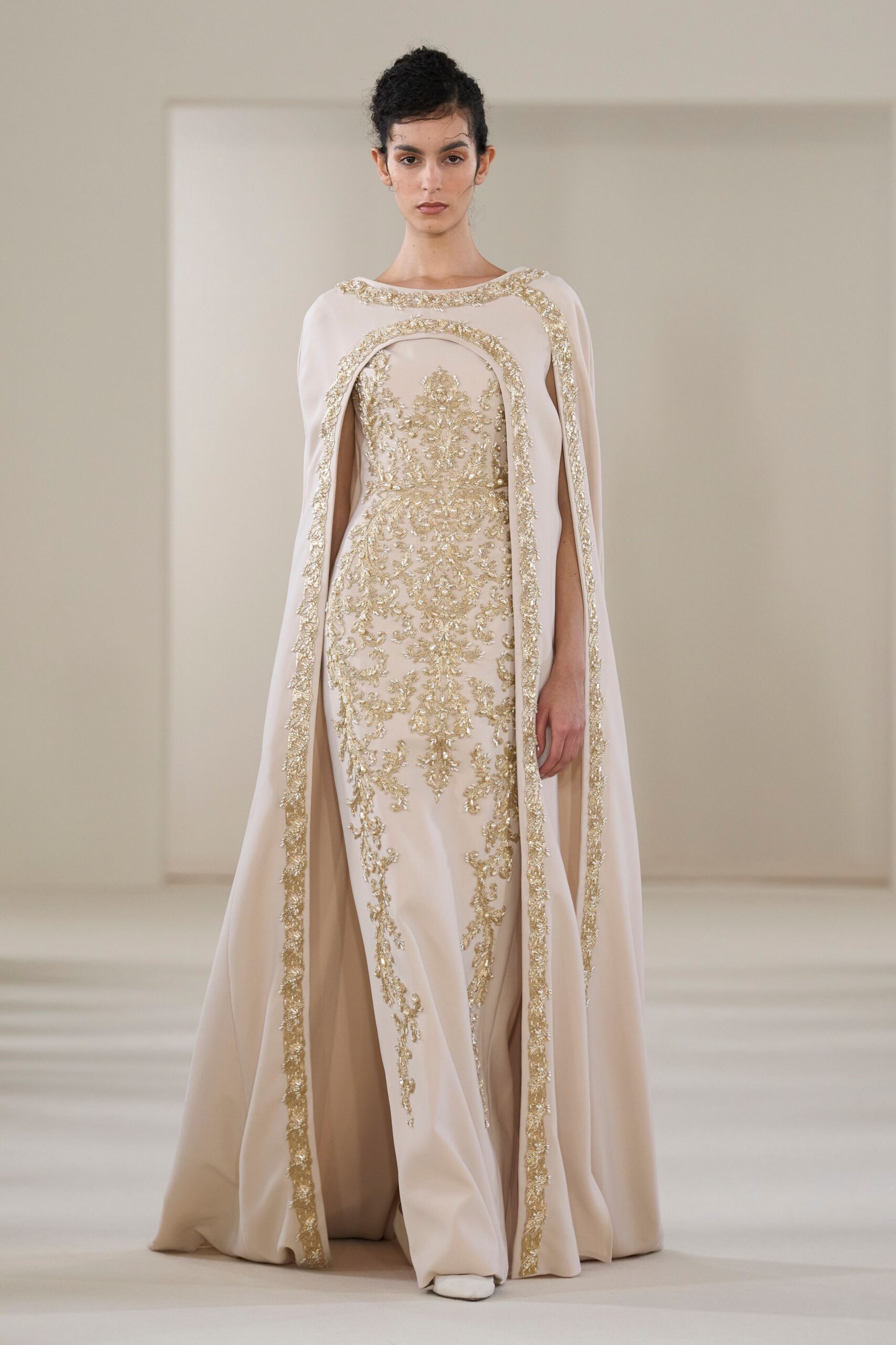 beige embroidered gown with cape