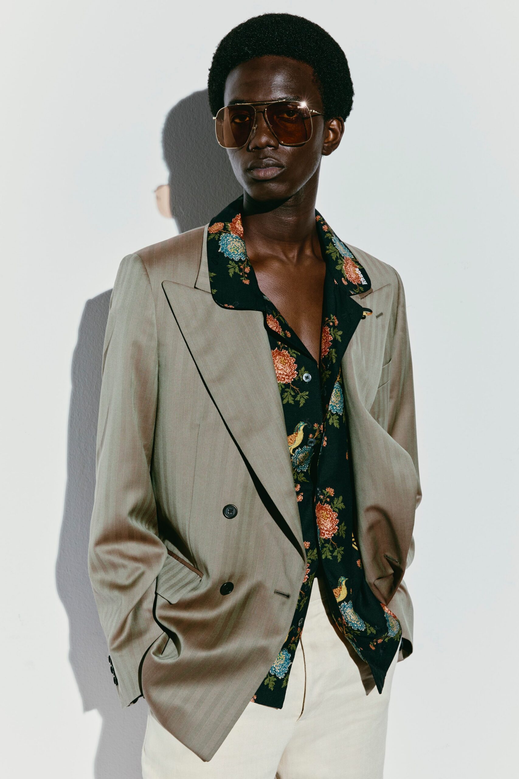 beige tailored blazer with floral shirt