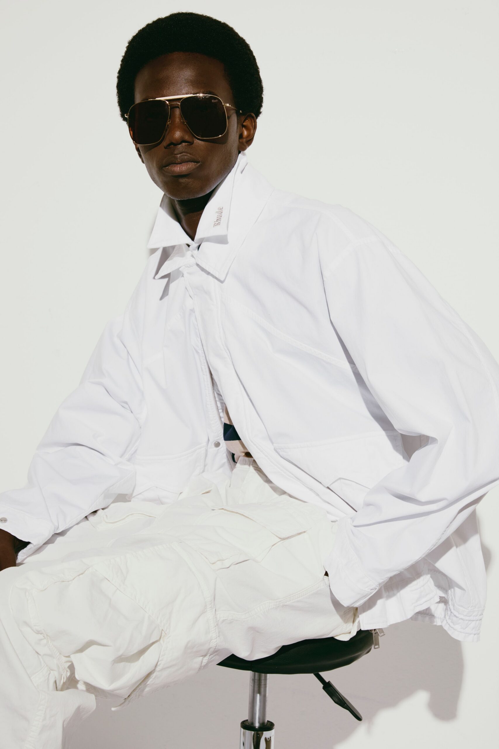 white relaxed jacket with cargo pants