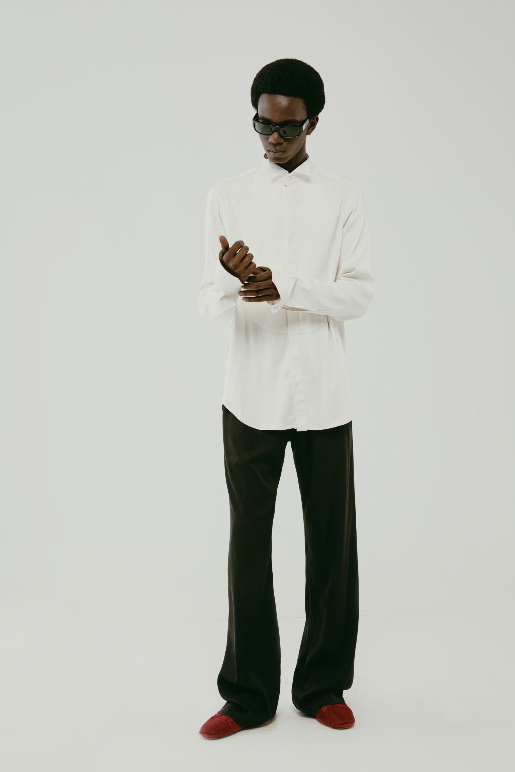 white relaxed shirt black pants