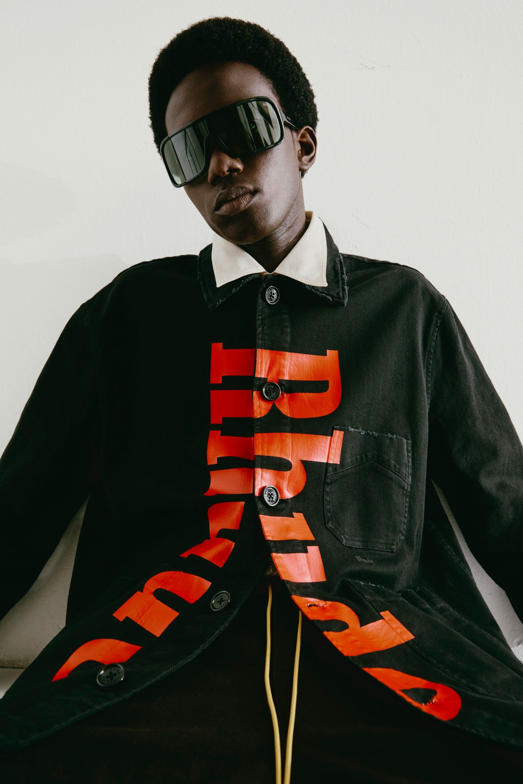 black and red printed jacket with sunglasses