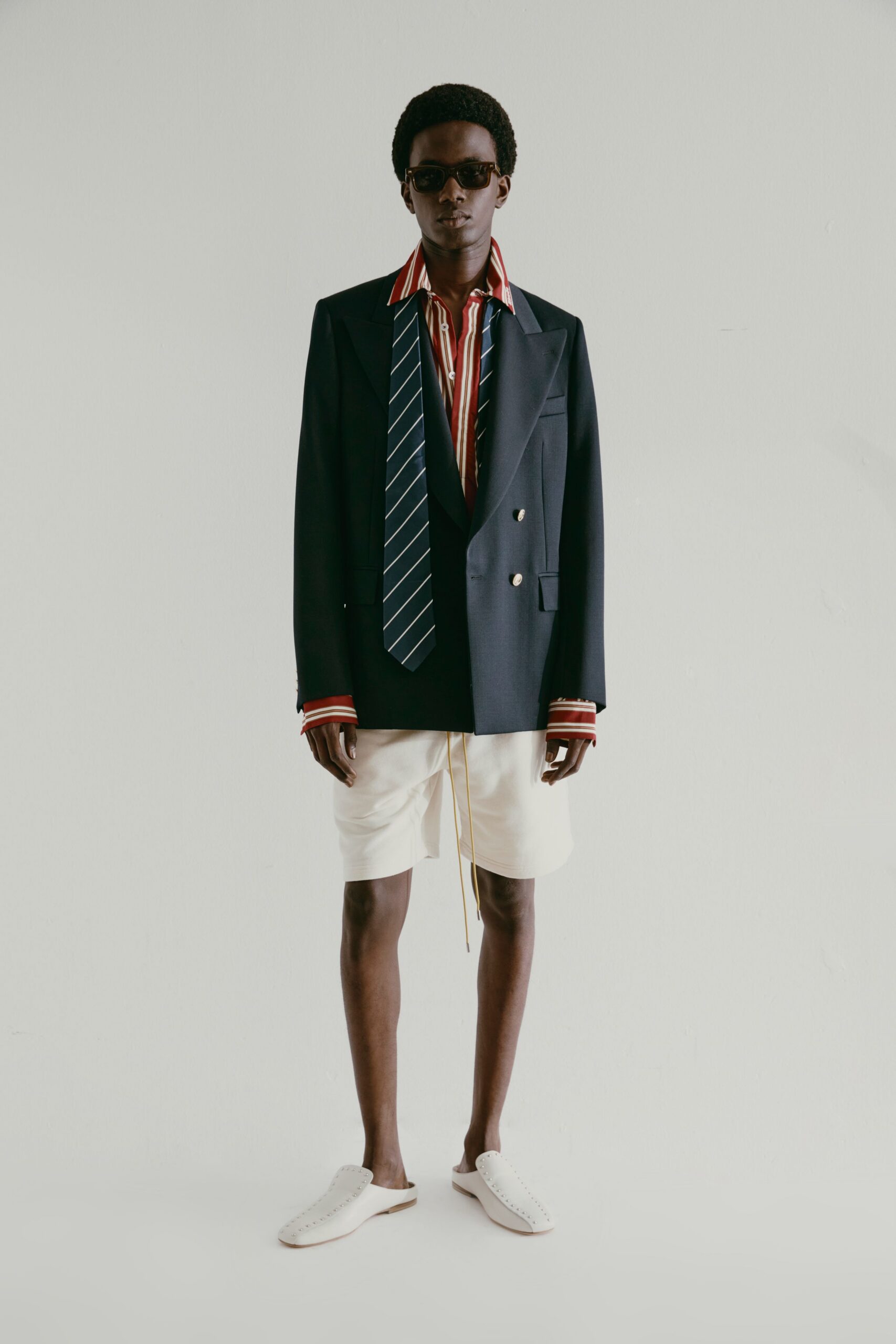 black blazer with striped shirt