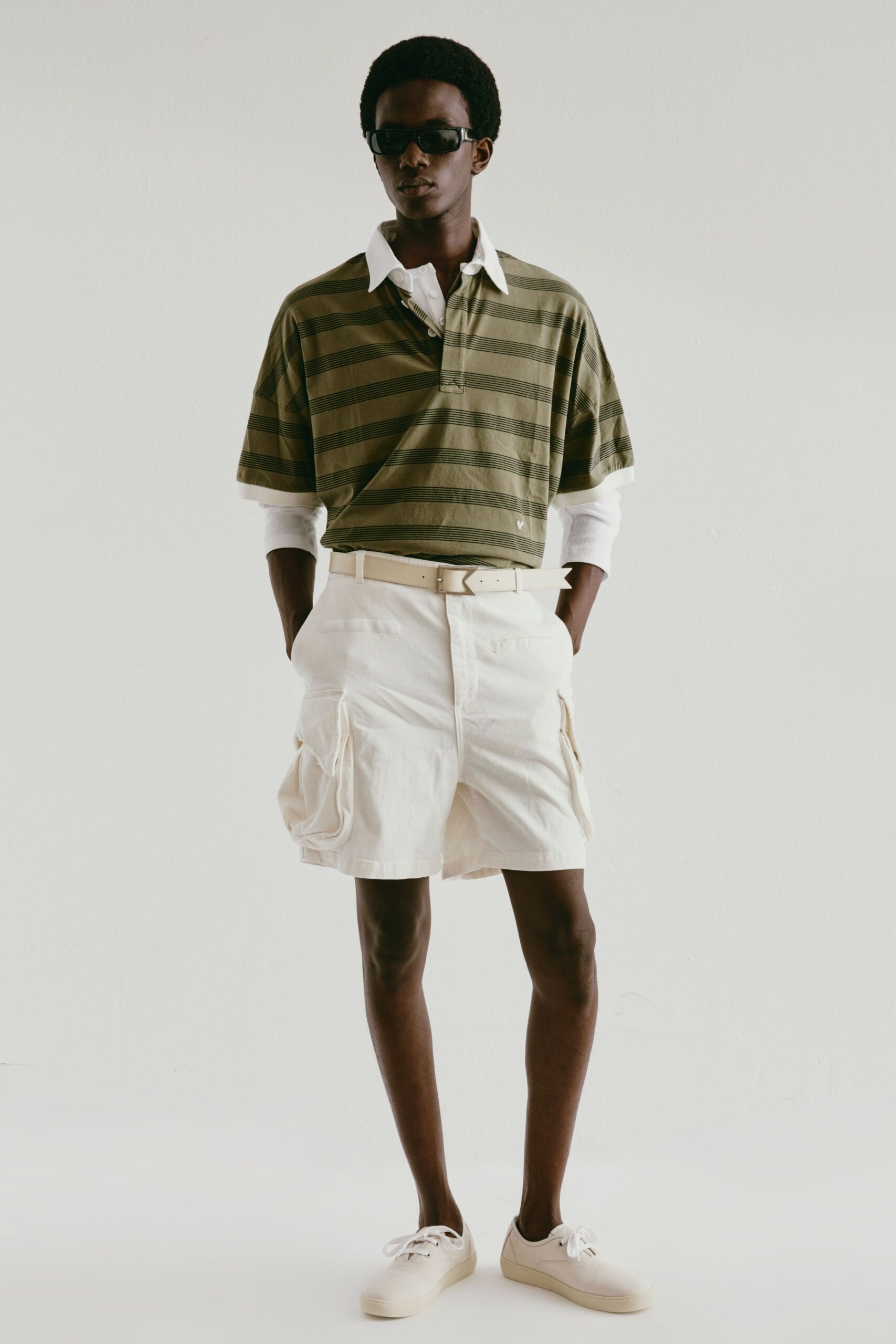 green striped top with beige shorts