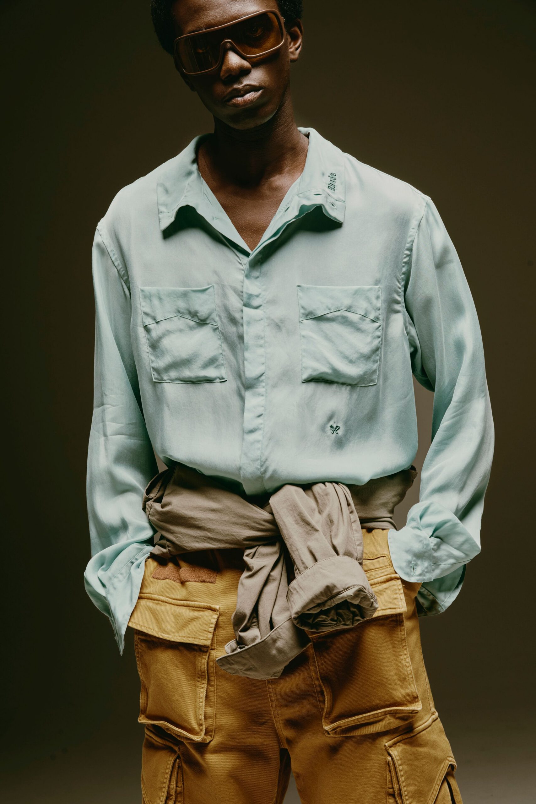 blue silk shirt with yellow cargo pants