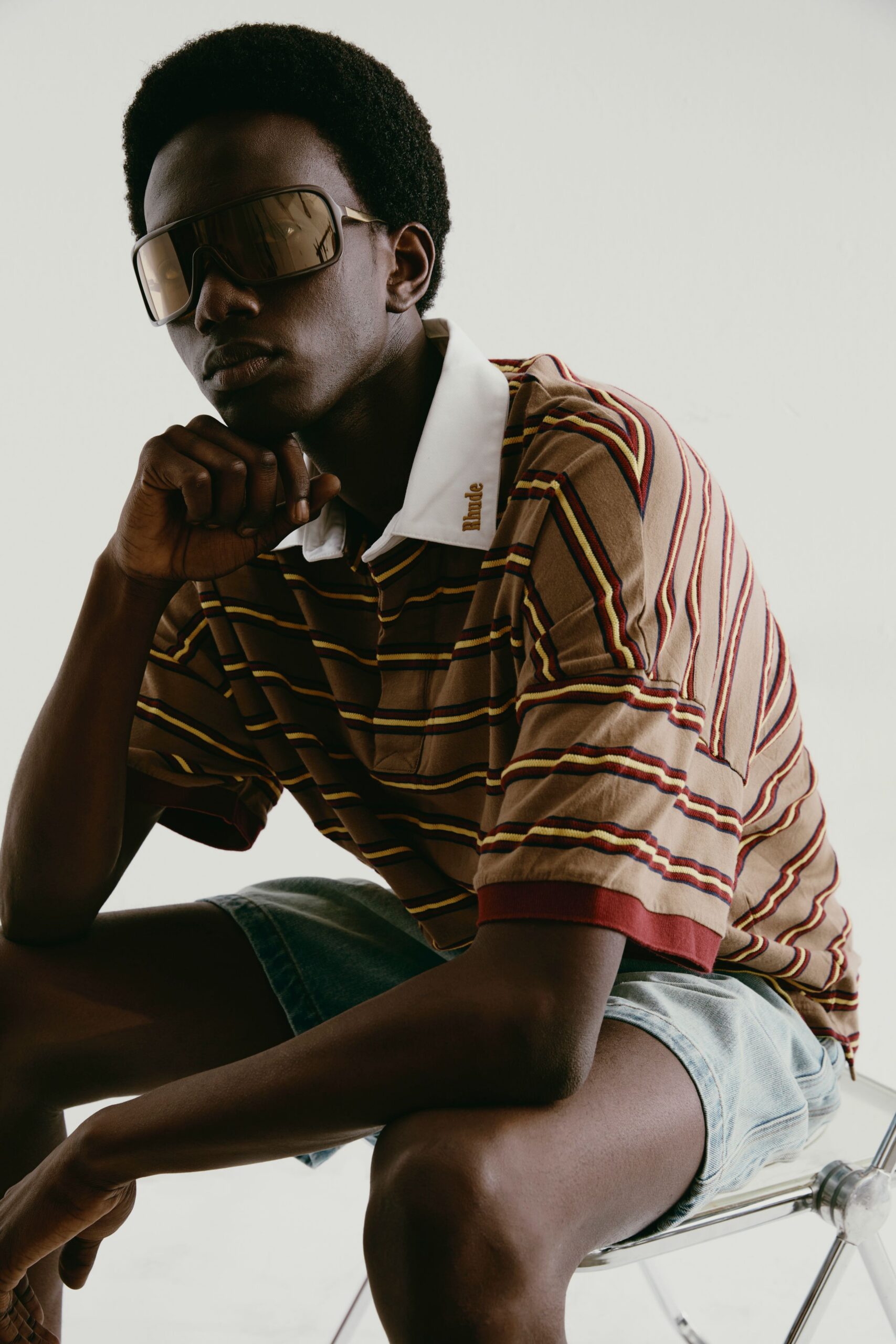 brown striped shirt with denim shorts