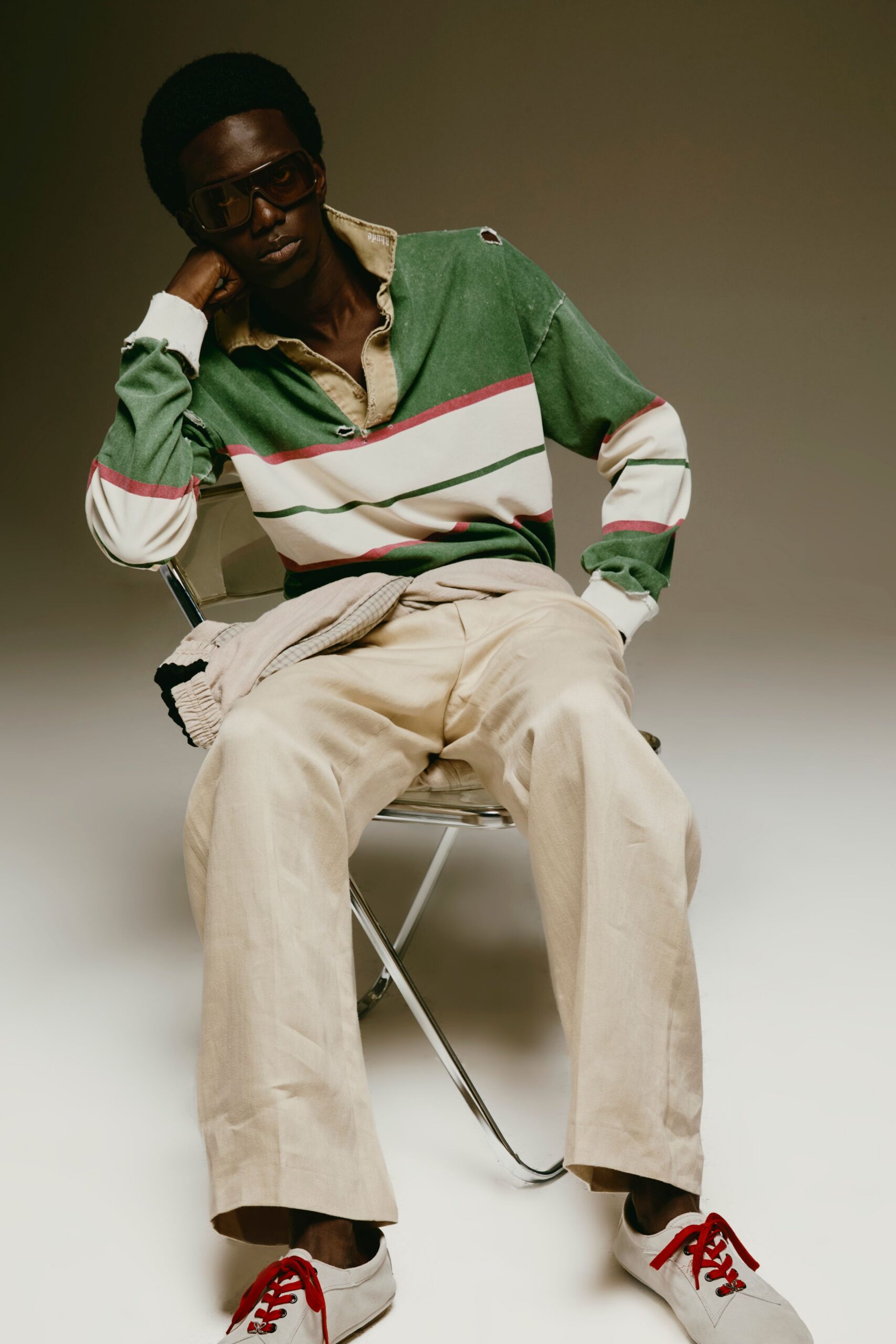 green striped shirt beige pants