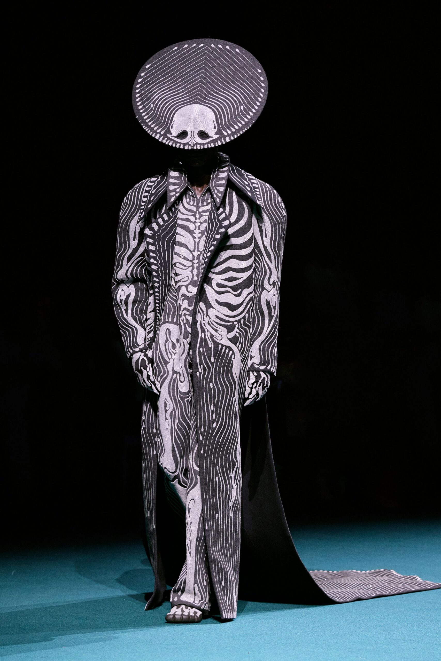 black and white printed coat and hat