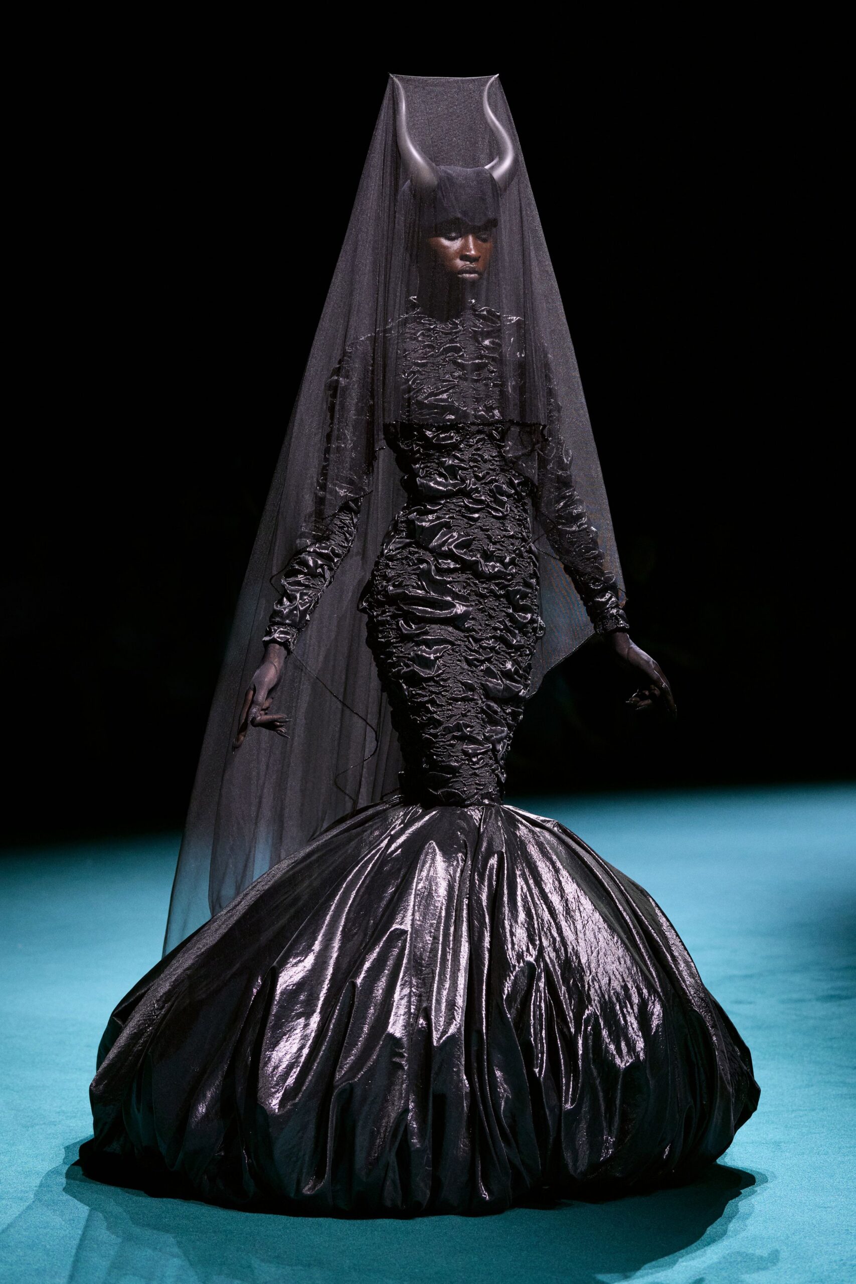 black silk fitted gown with veil