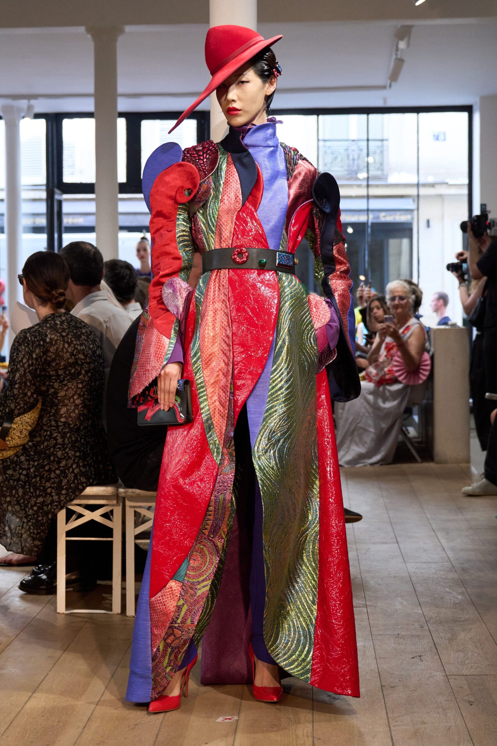 colorful layered gown with hat