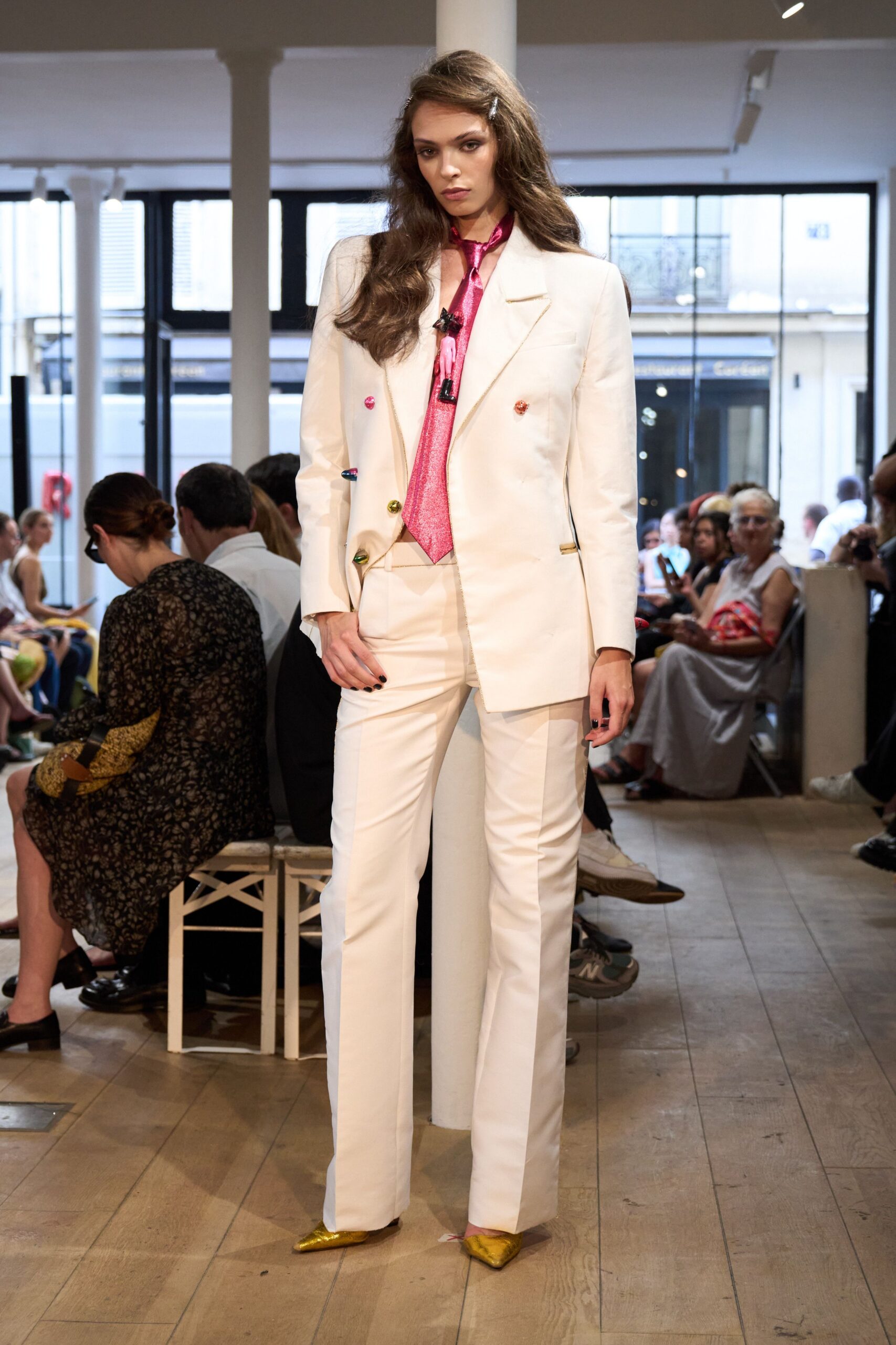 white tailored suit with pink shirt