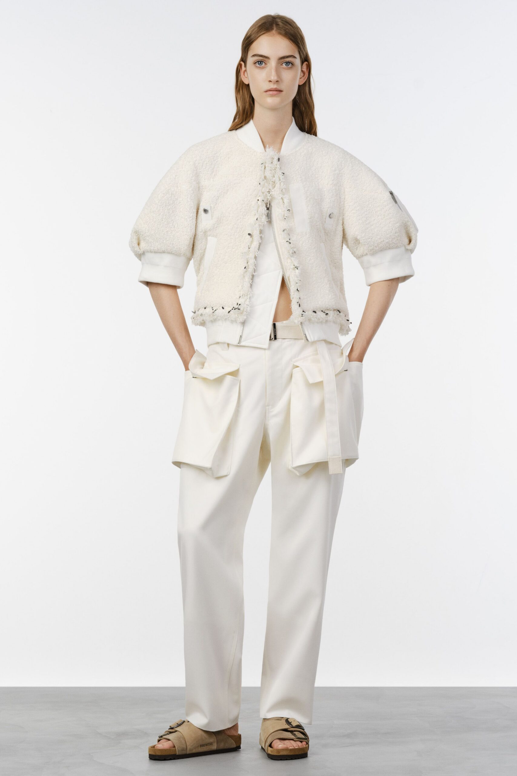 white cotton short-sleeve collared relaxed buttoned pockets jacket
