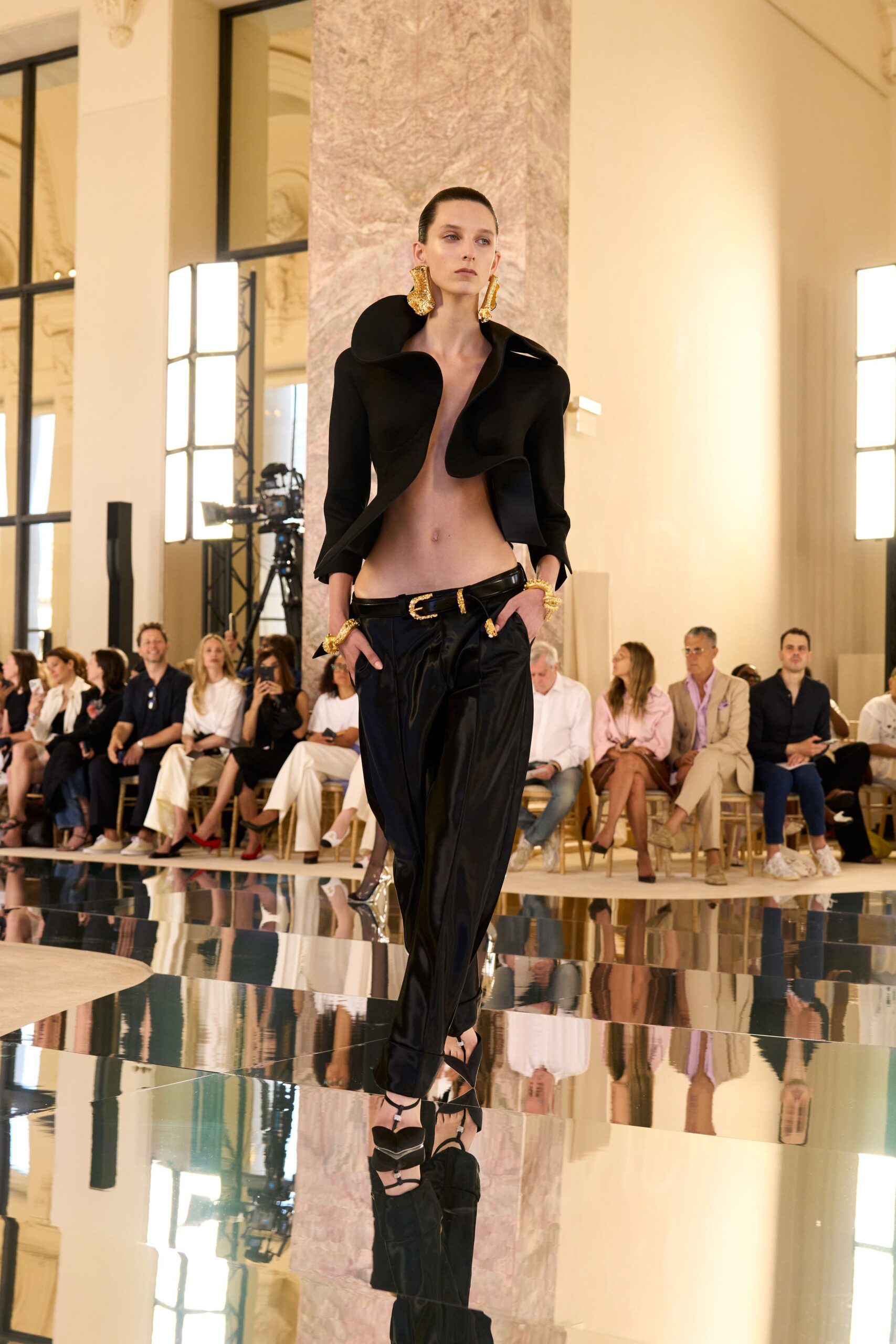 black silk fitted jacket and relaxed pants