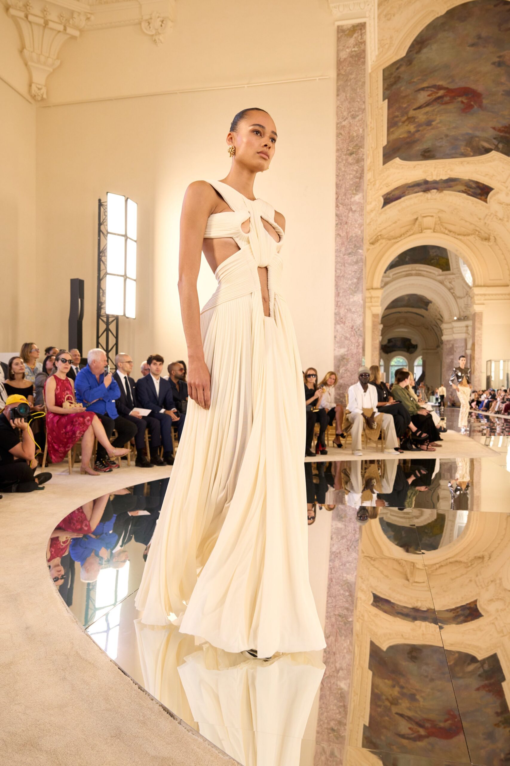 white silk sleeveless gown