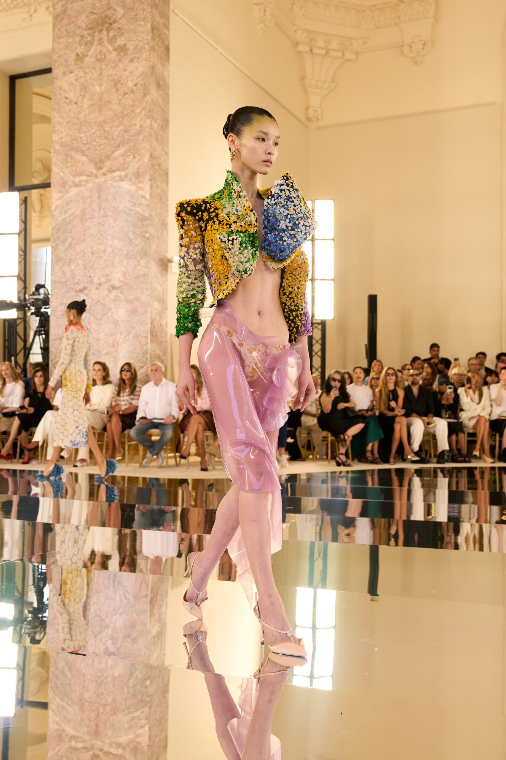 multi-colored fitted jacket with pink skirt