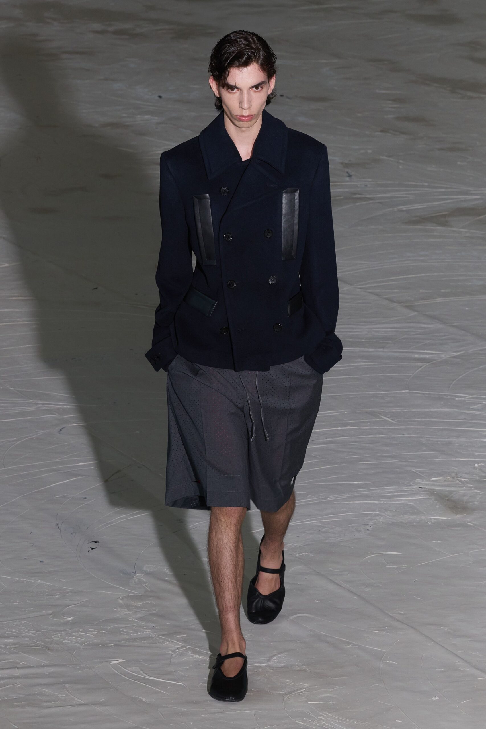 black structured jacket gray shorts