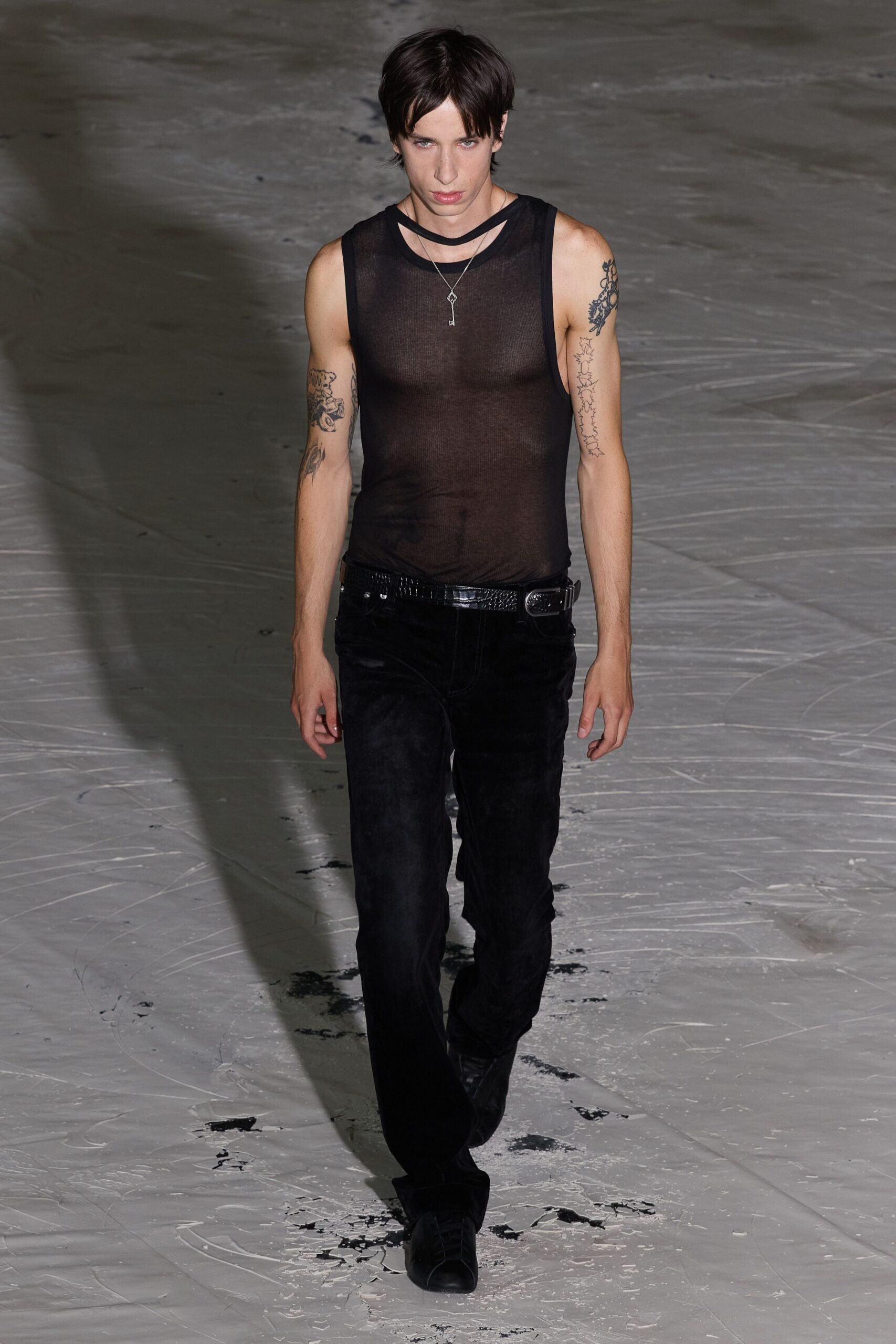 black mesh tank-top with slim pants