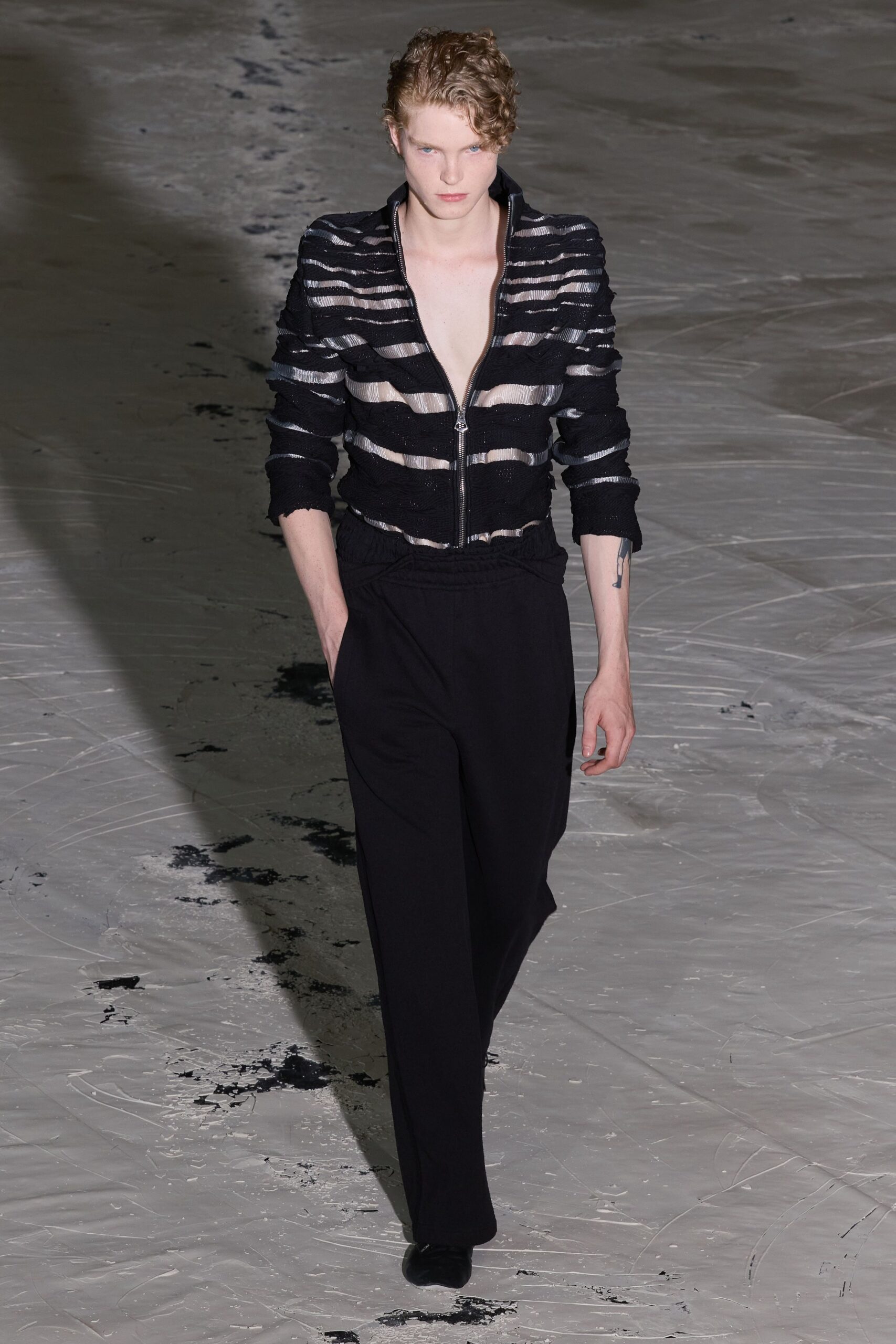 black and white striped jacket with relaxed pants