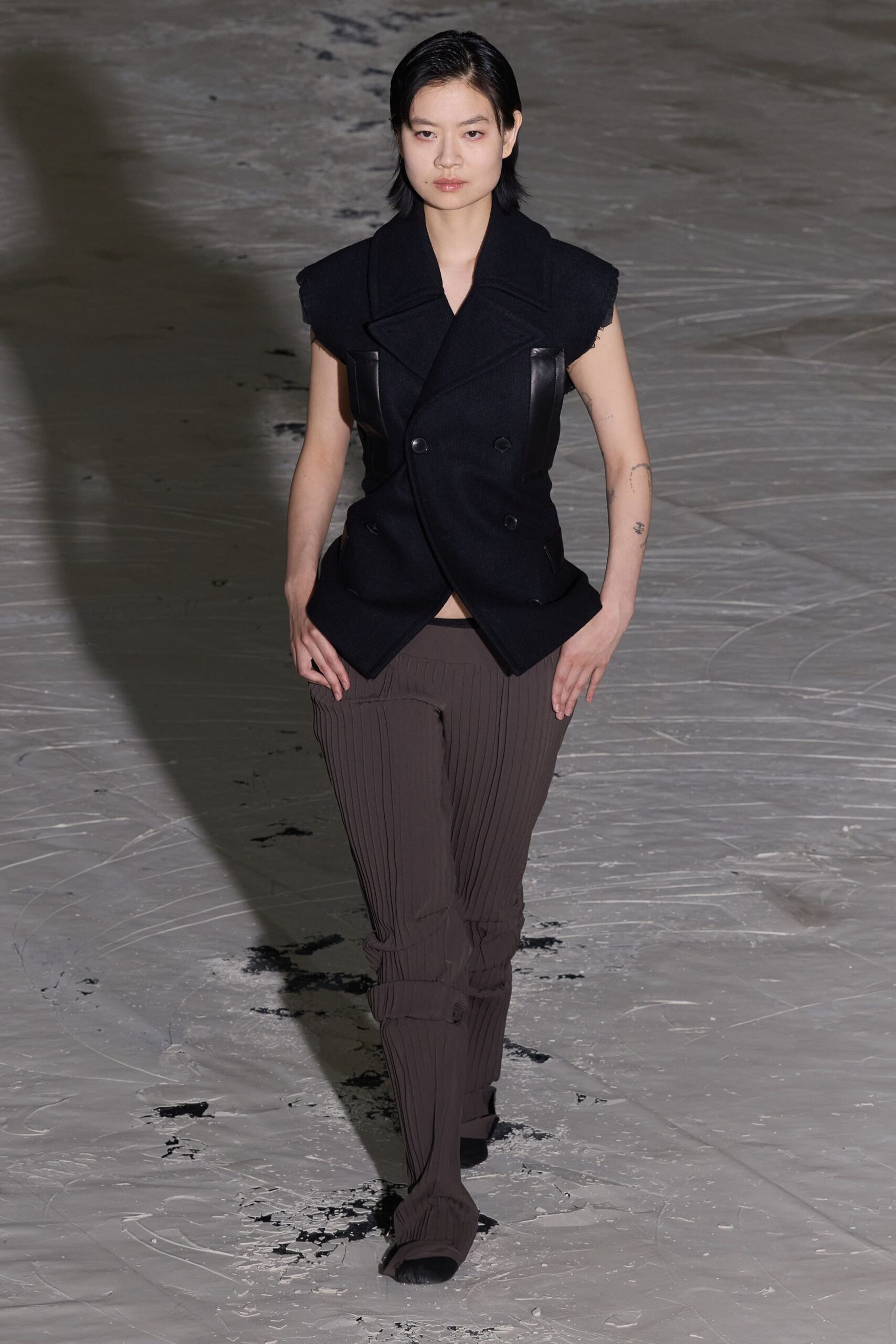 black blazer brown pleated pants