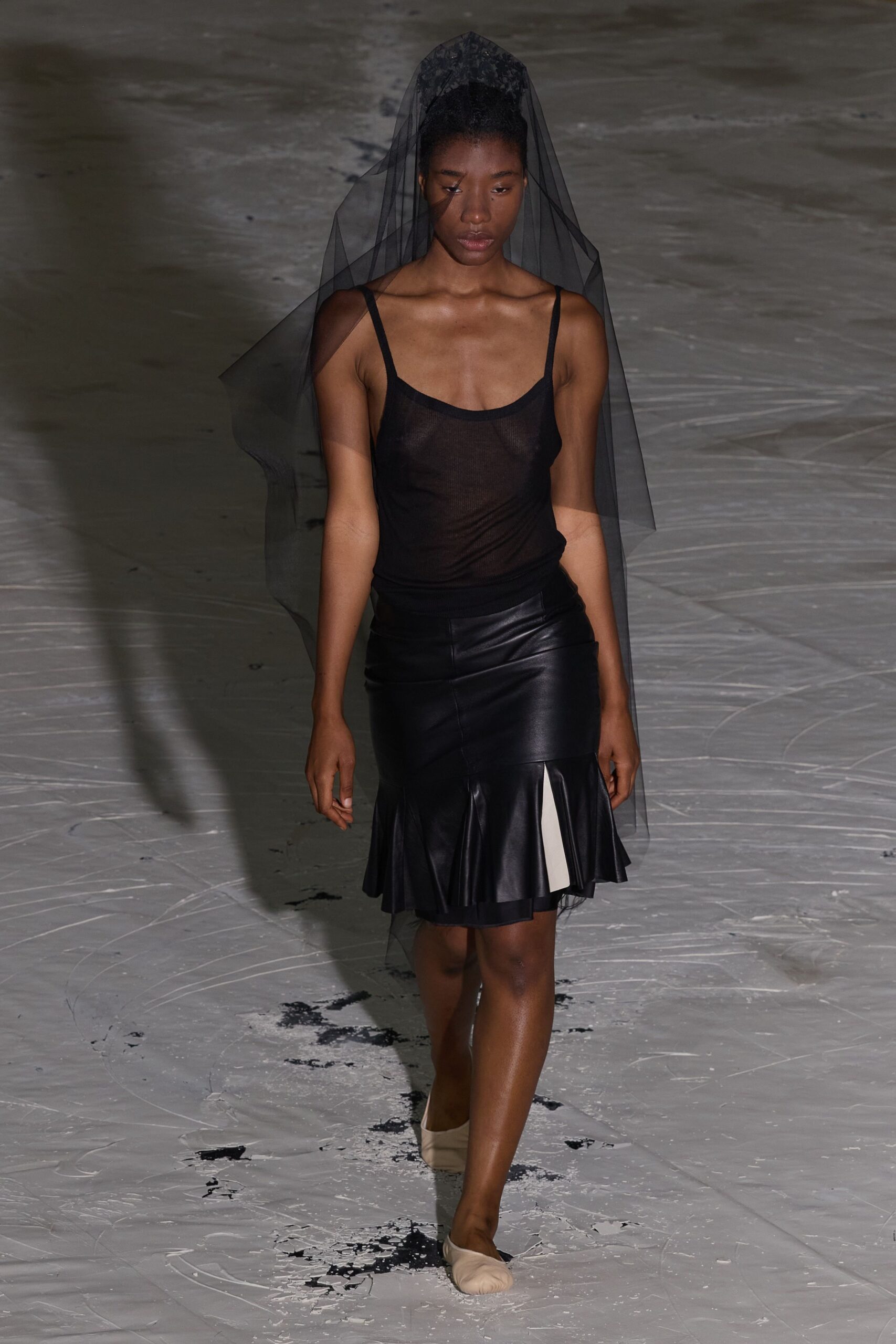 black mesh top with leather skirt