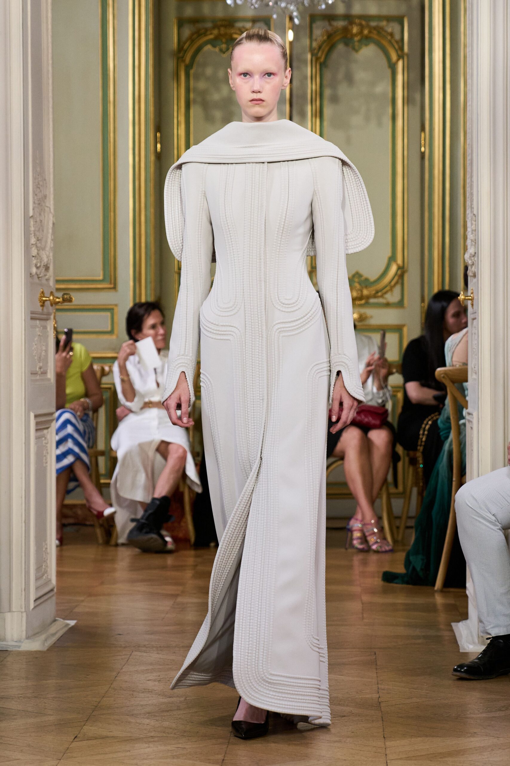 white fitted gown with long sleeves