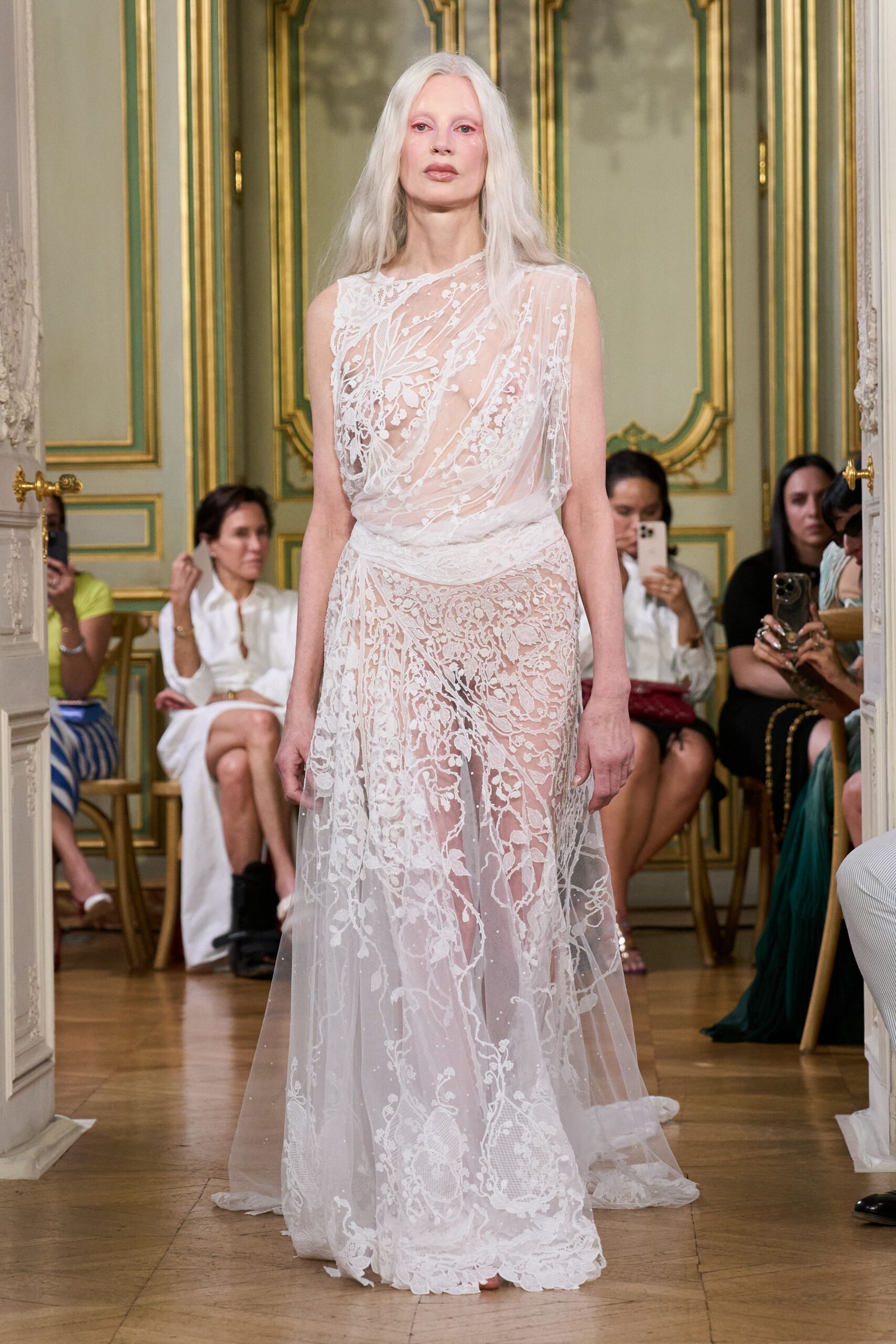white lace sleeveless gown