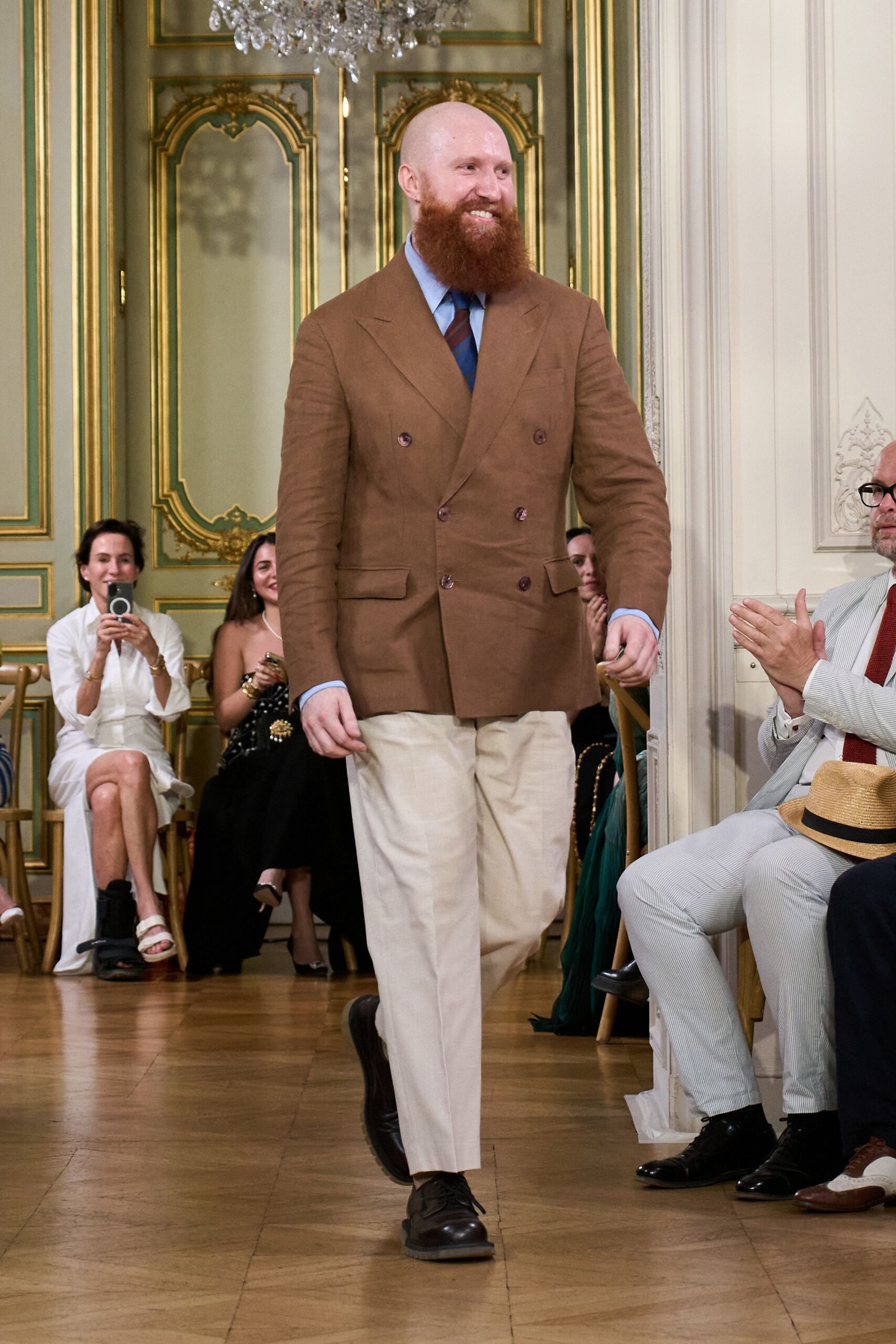 brown tailored blazer with blue shirt