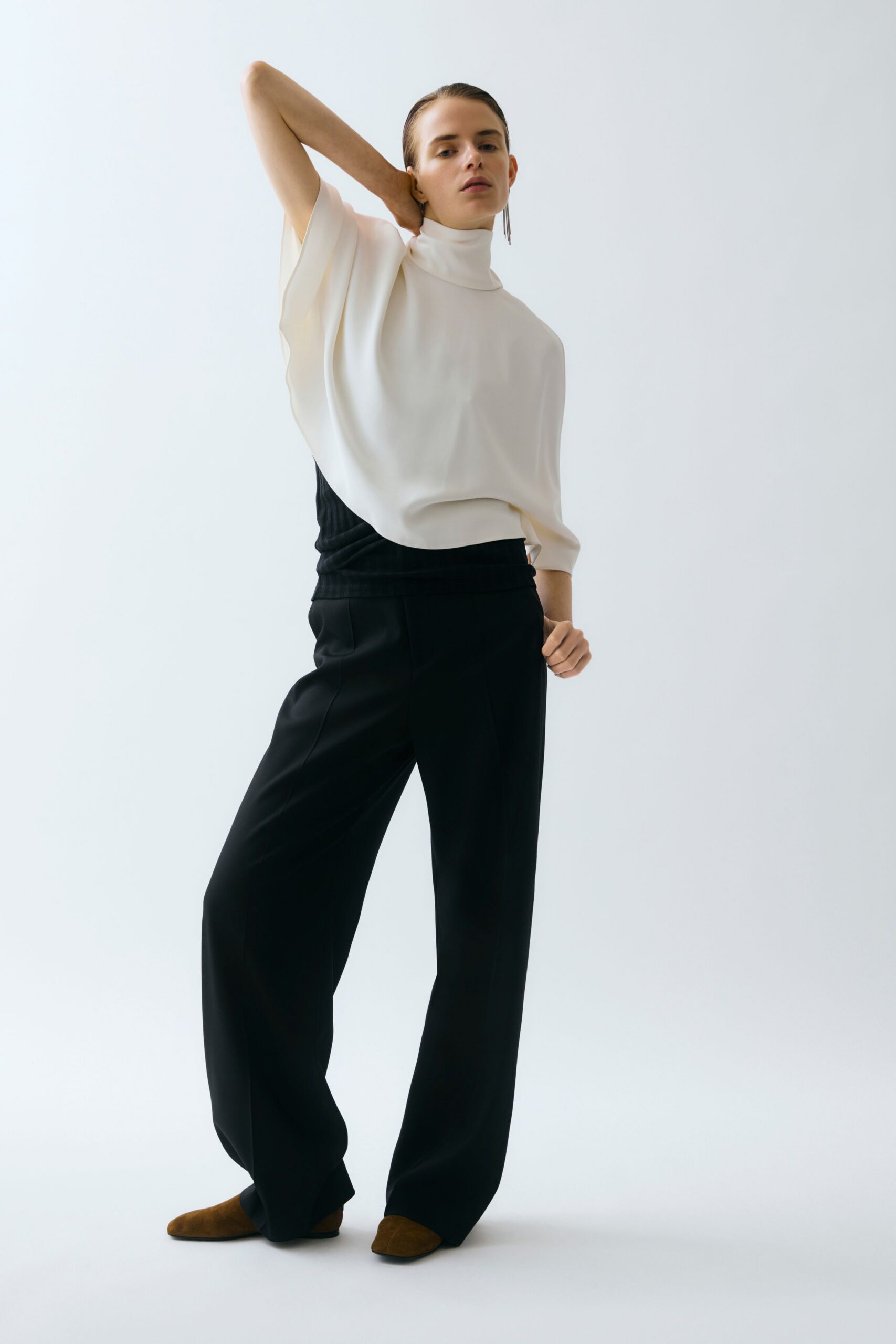 white silk sleeveless high-neck relaxed draped top