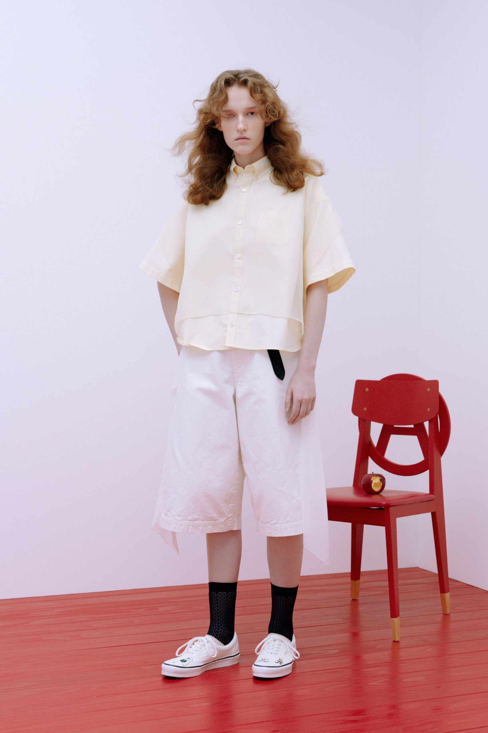 yellow relaxed shirt with white shorts