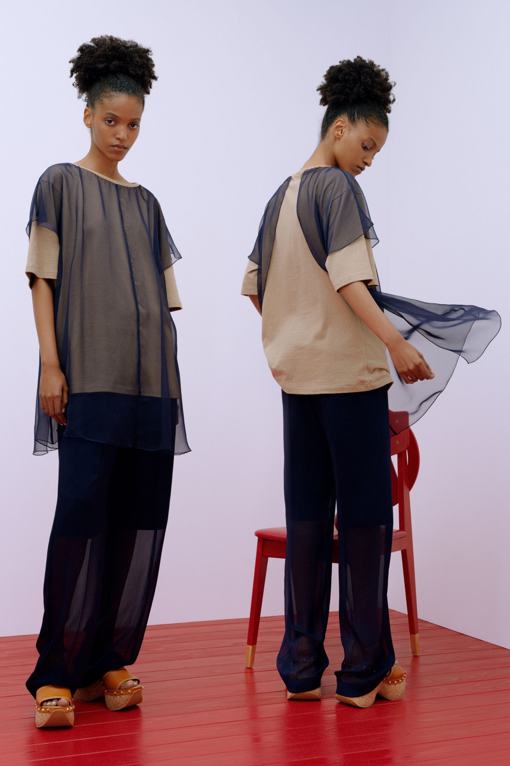 beige navy sheer top with wide-leg pants