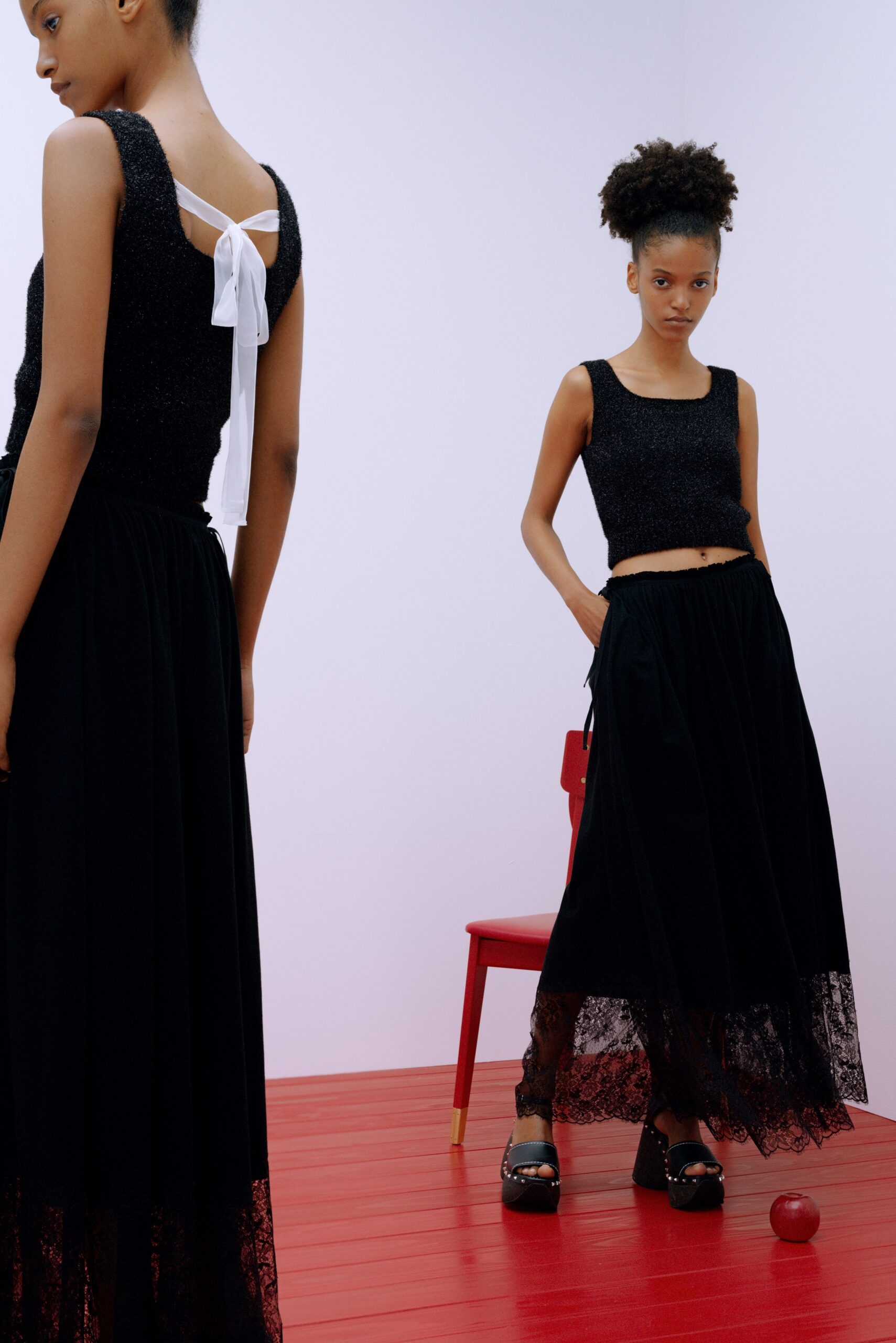 black textured top and lace skirt