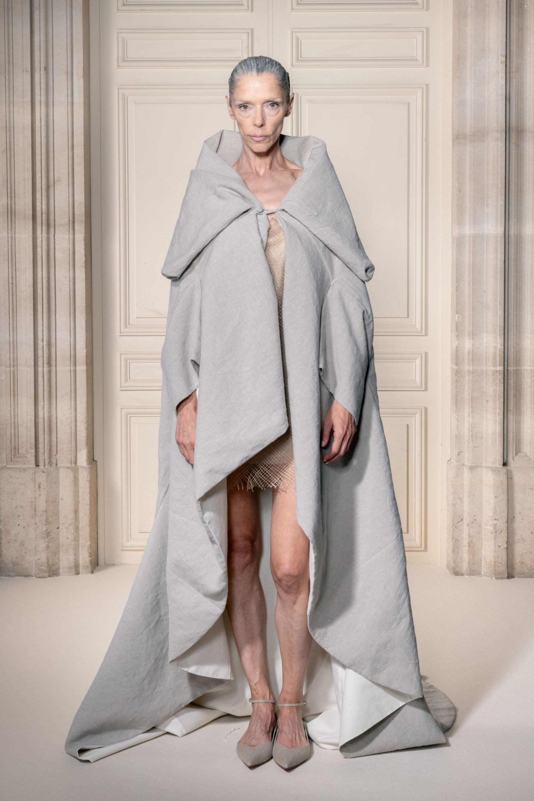 gray oversized cape with mini dress