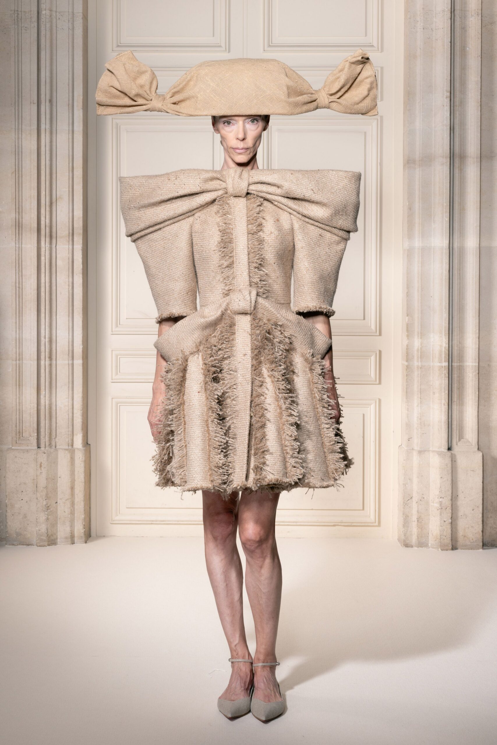beige ruffled mini dress with hat