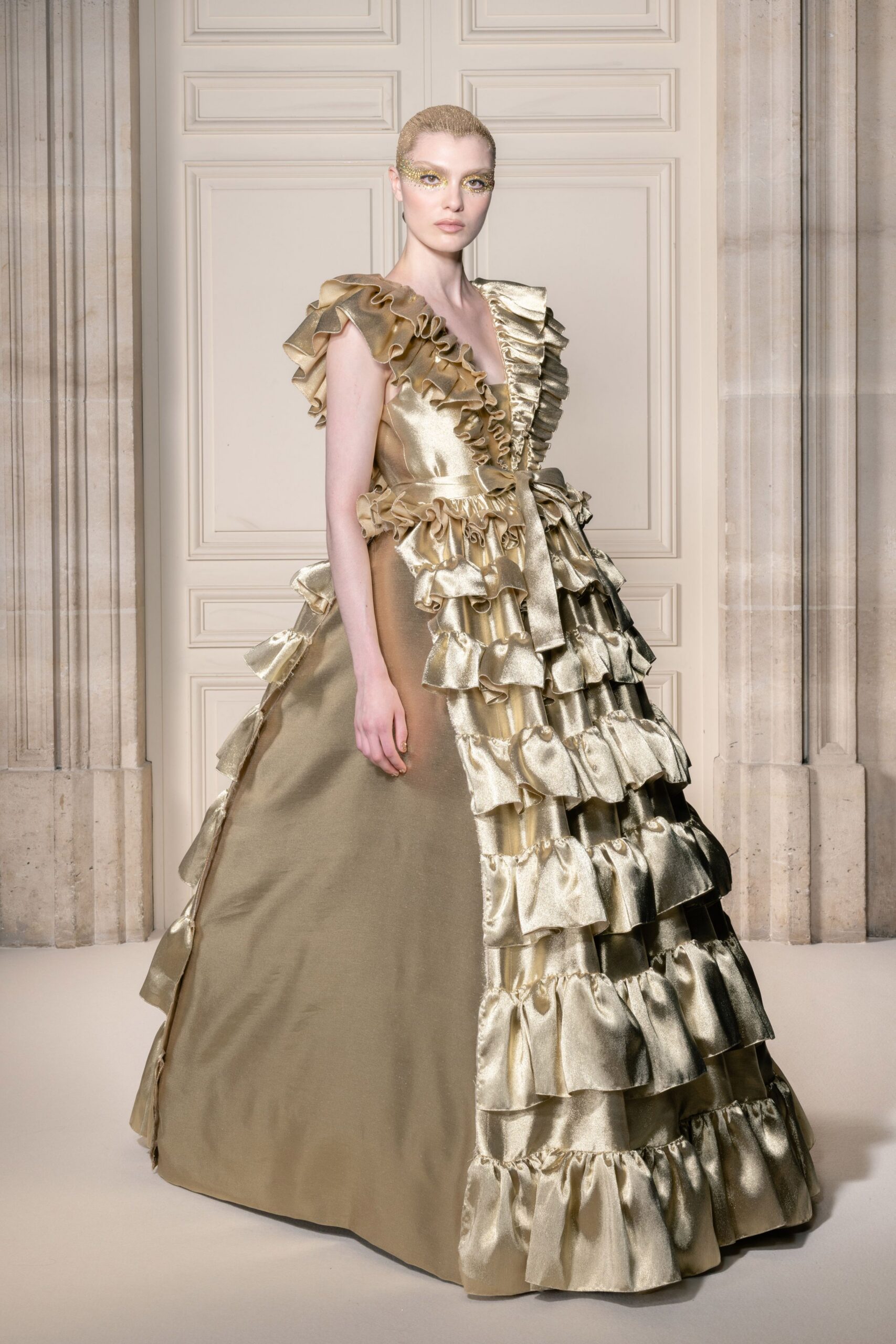 gold satin sleeveless gown