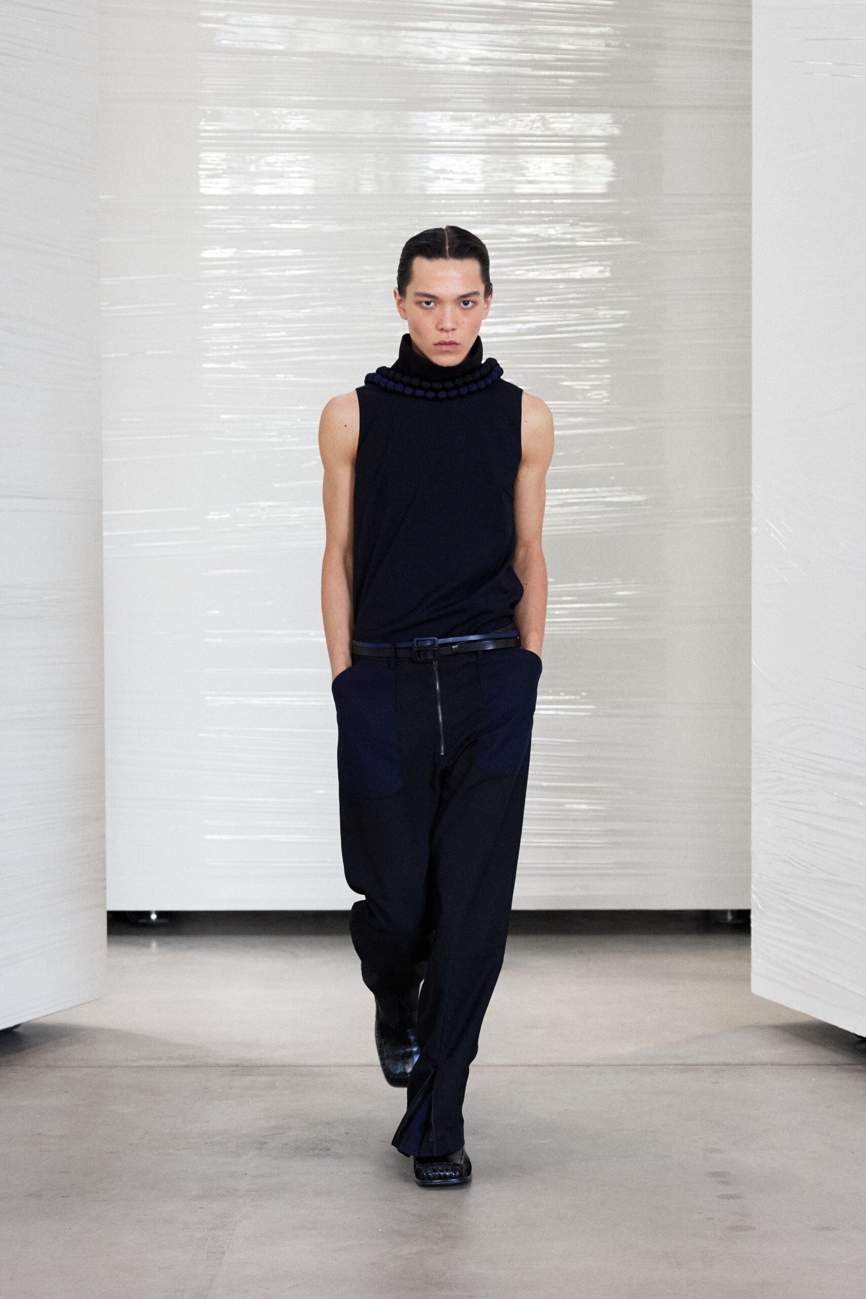 black cotton sleeveless high-neck fitted top