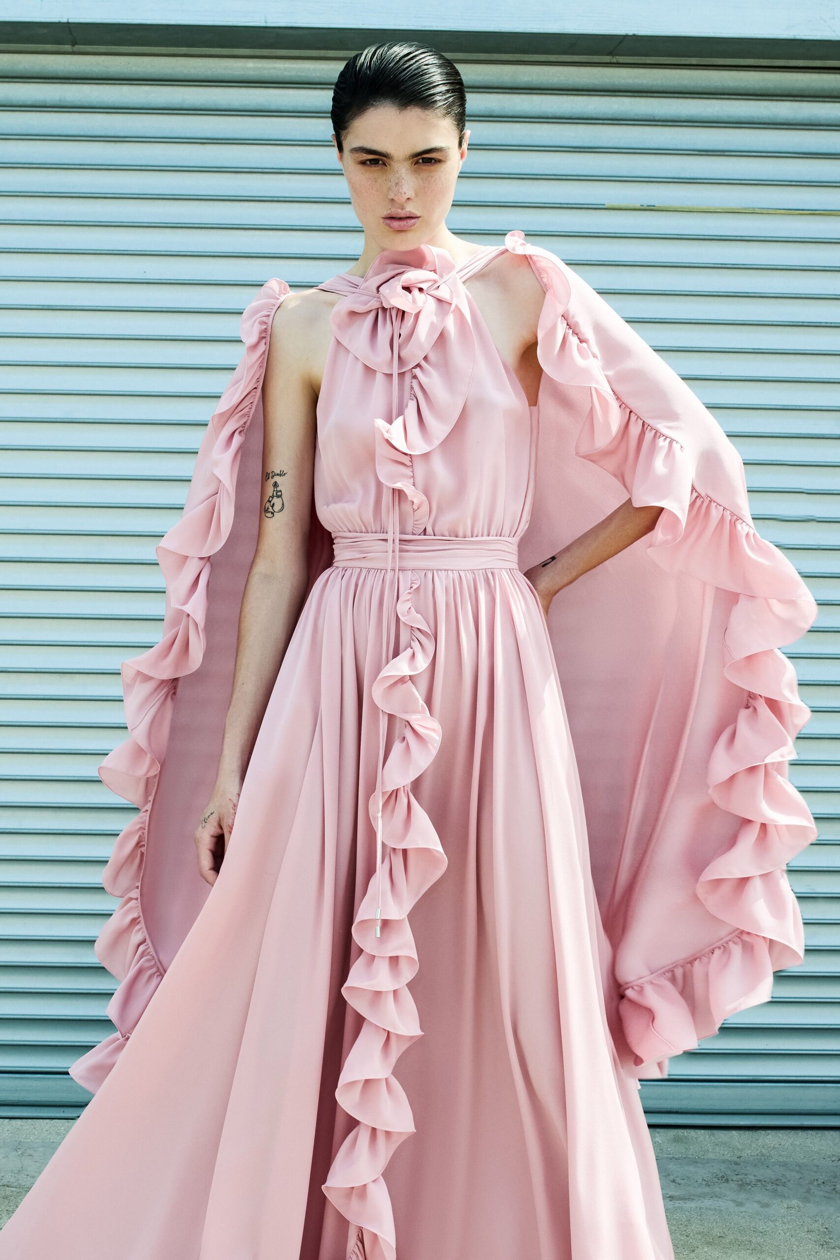 pink silk sleeveless v-neck fitted ruffled draped gown