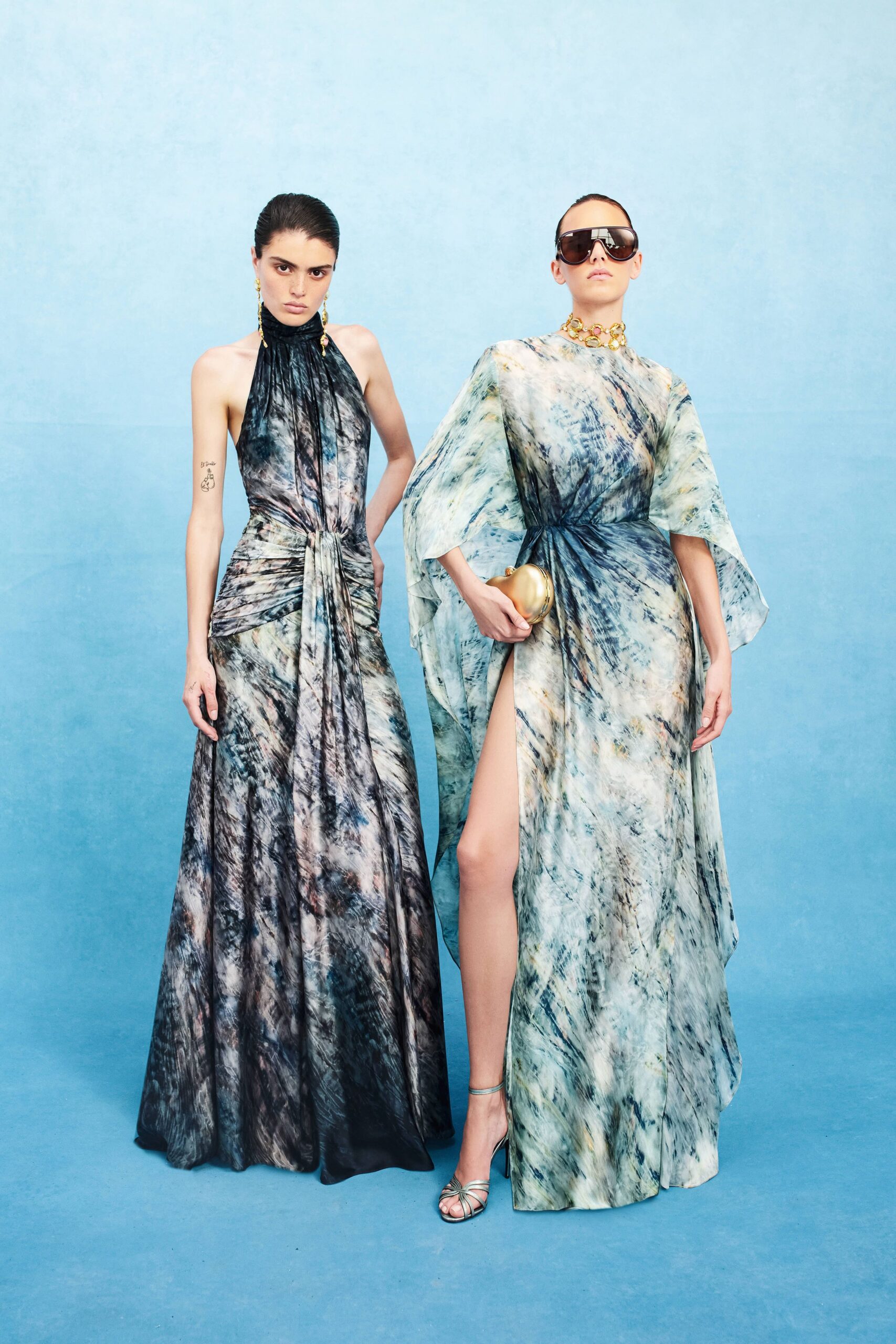 blue silk sleeveless high-neck fitted draped tiered gown
