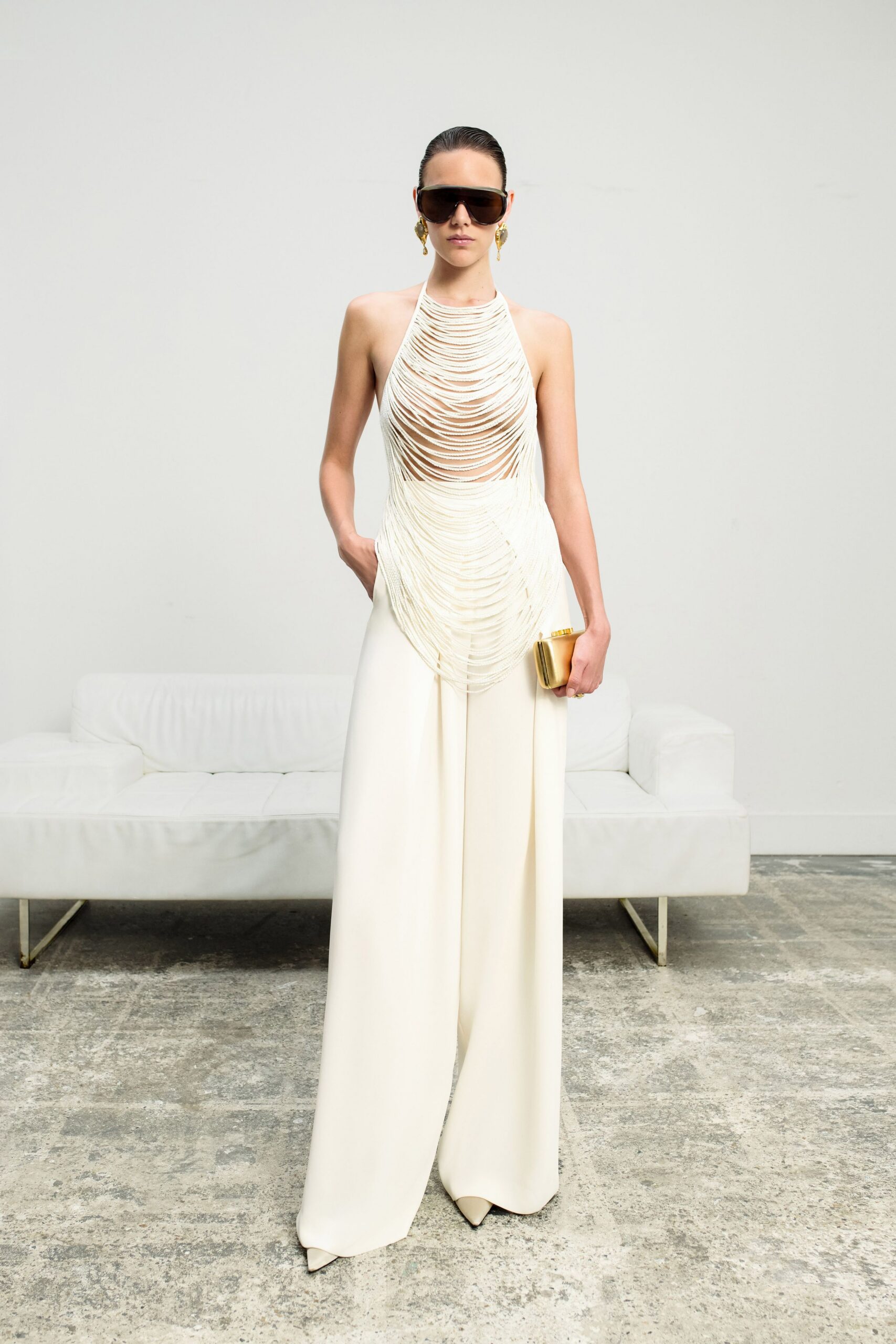 white fitted sleeveless jumpsuit