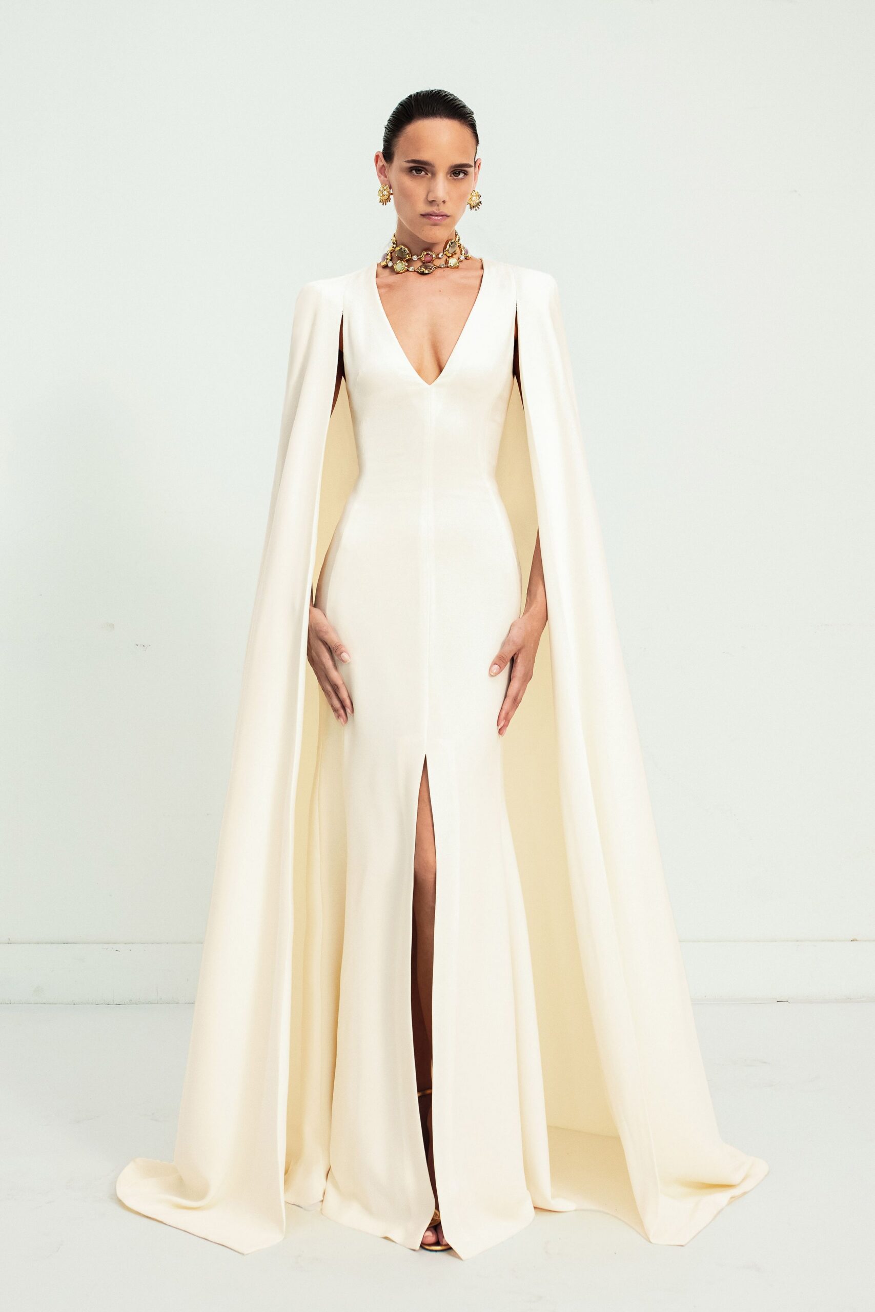 white silk sleeveless v-neck fitted draped maxi gown