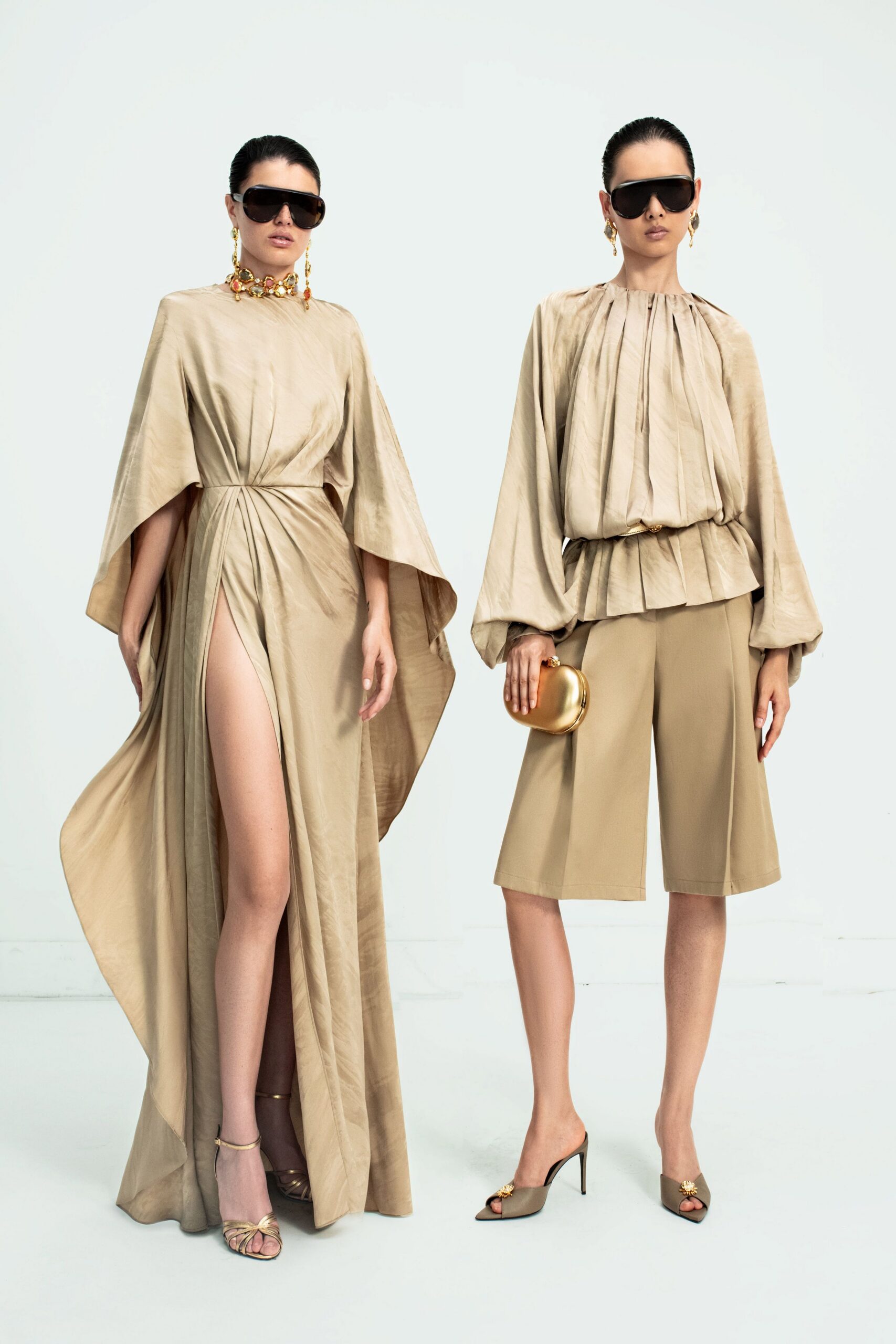 beige silk sleeveless v-neck fitted draped flowing gown