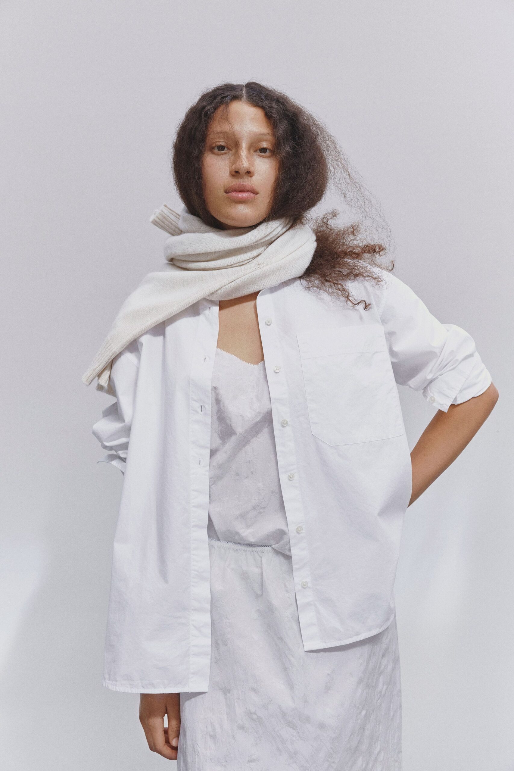 white cotton long-sleeve collared relaxed buttoned shirt