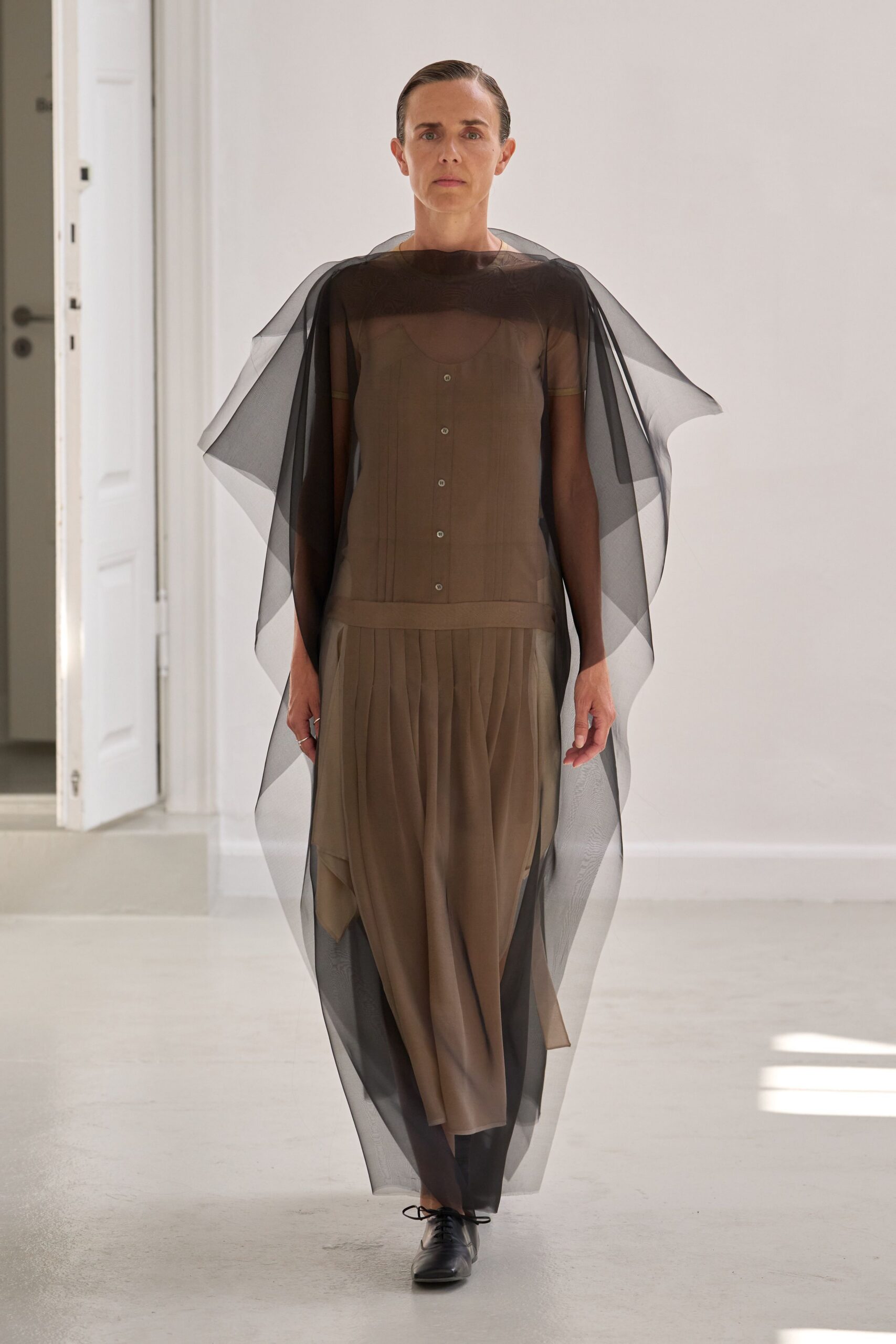 brown silk midi dress with black cape