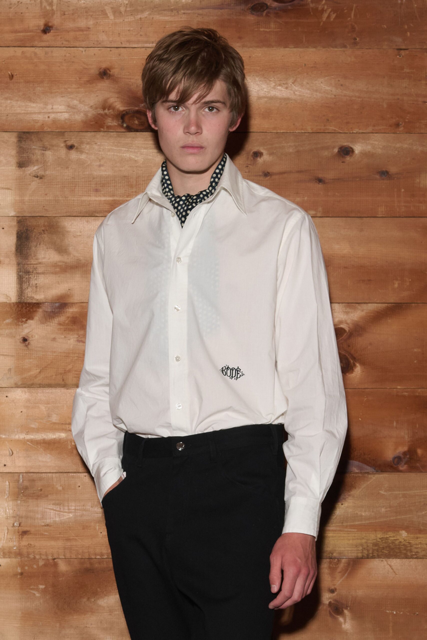 white cotton long-sleeve collared relaxed buttoned shirt